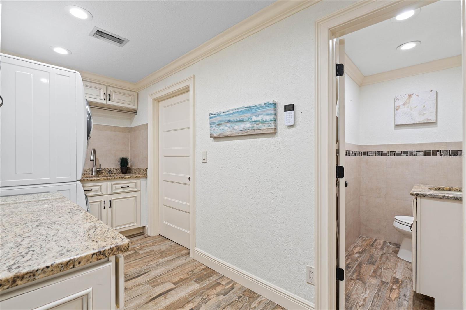 Laundry Room Adjacent to Garage