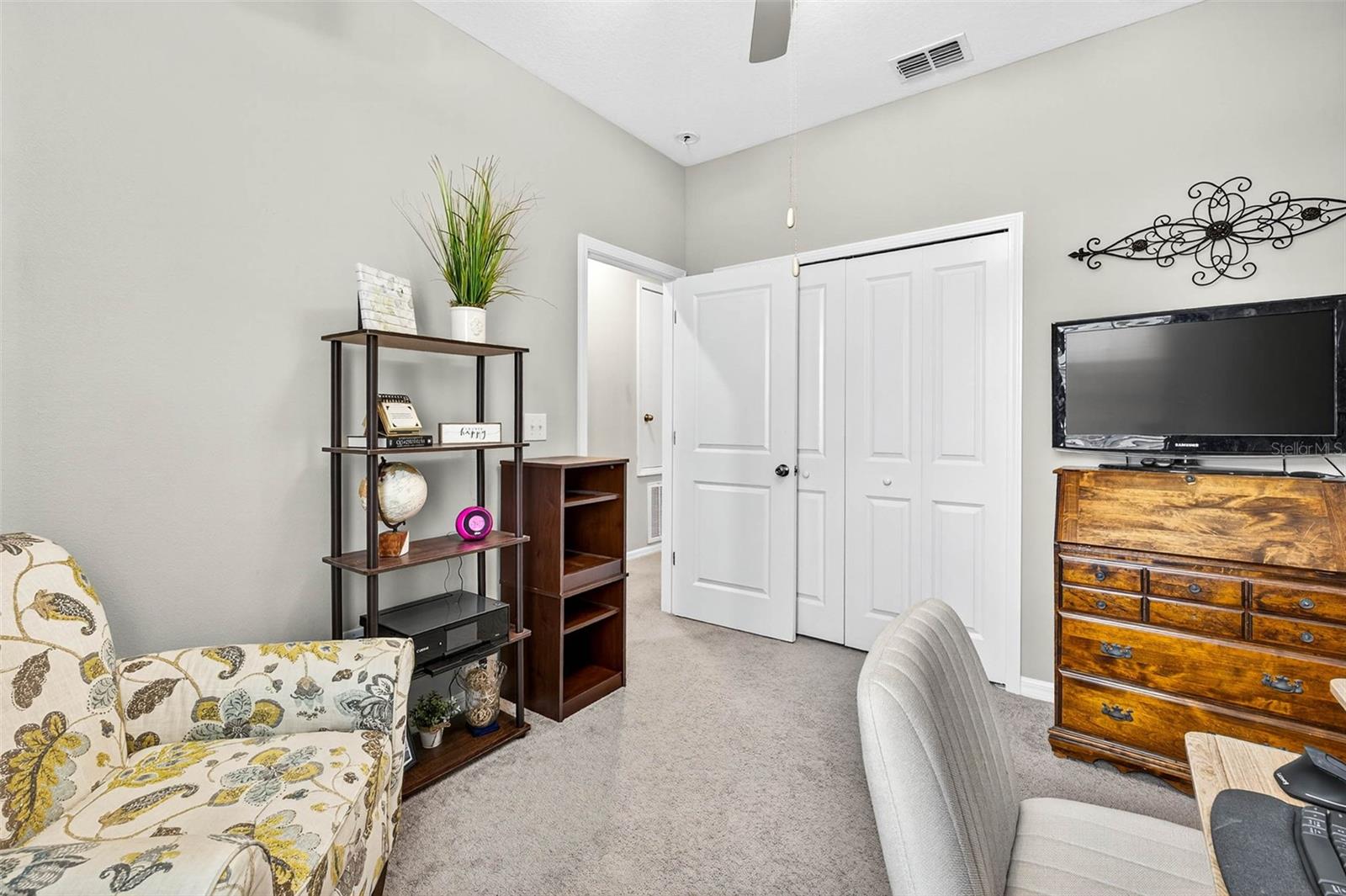 Bedroom 2 with built-in closet.