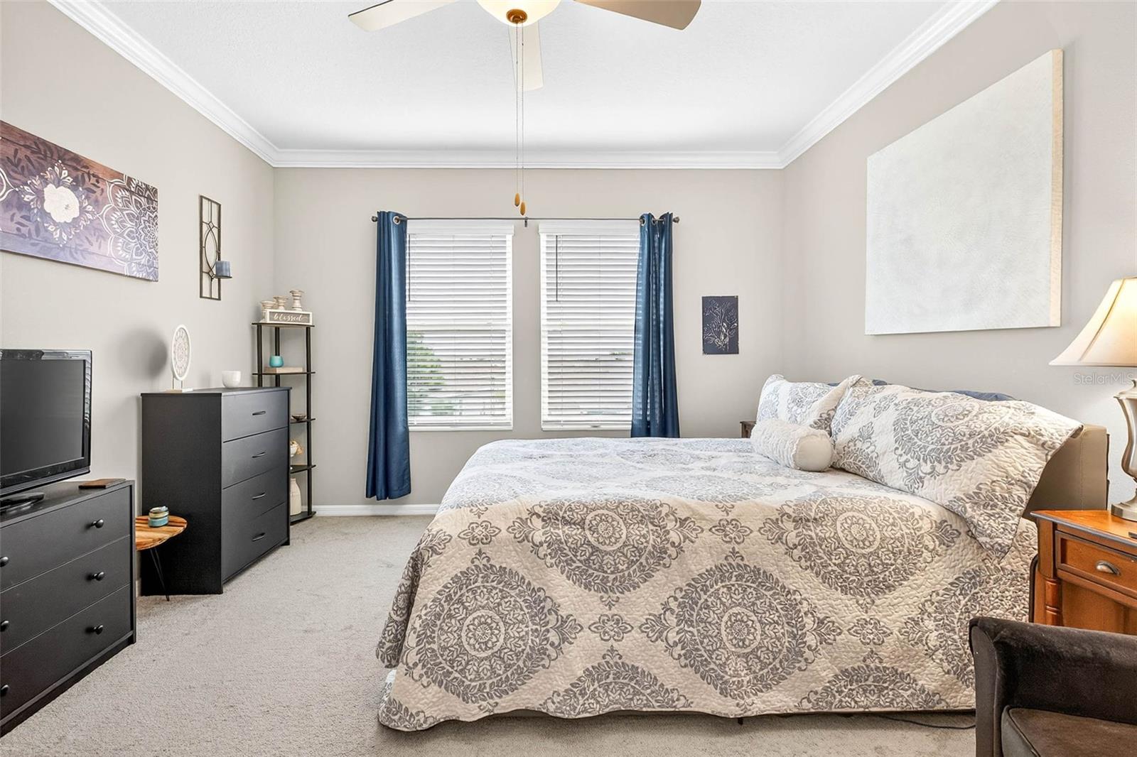 Large primary suite with ensuite bath and walk in closet.