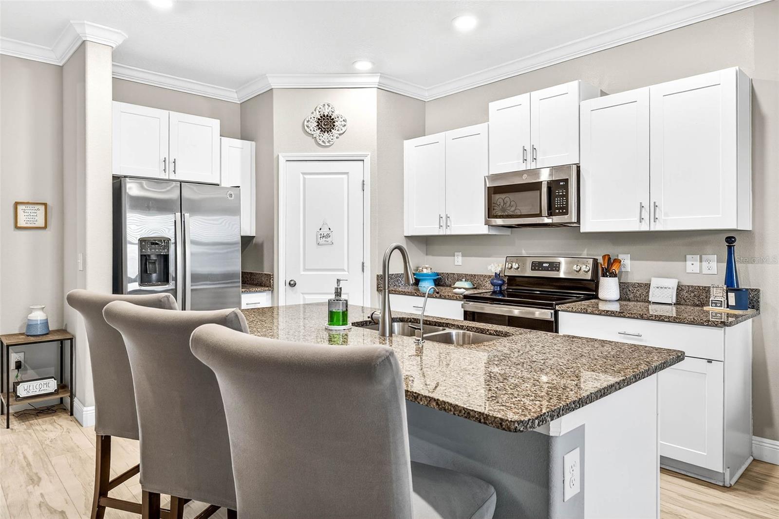 Love your kitchen! Granite countertops, stainless steel appliances, closet pantry & still more room for a formal table set.