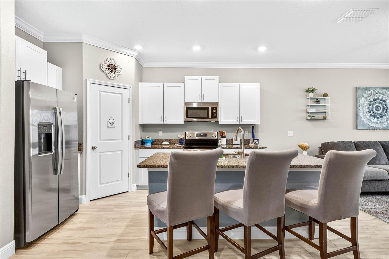 Bright & high ceilings with crown throughout.