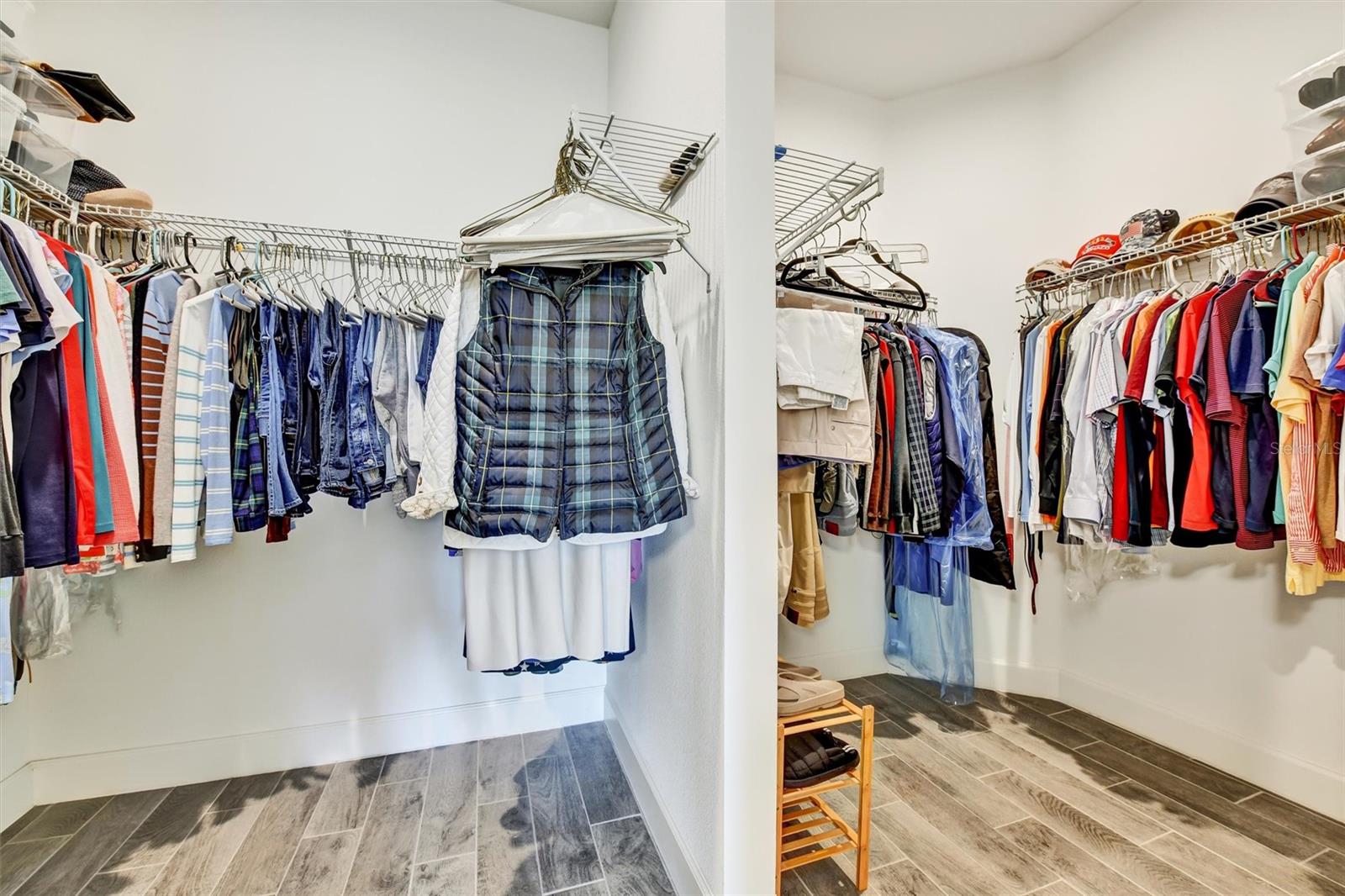 Primary closet, his and her