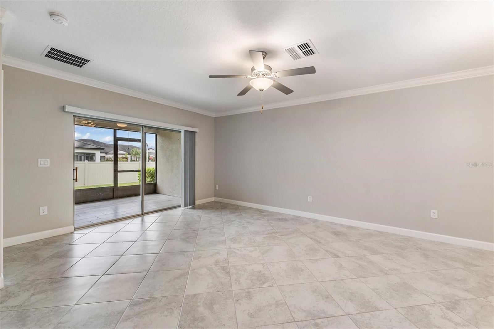Lanai is tiled and screened in