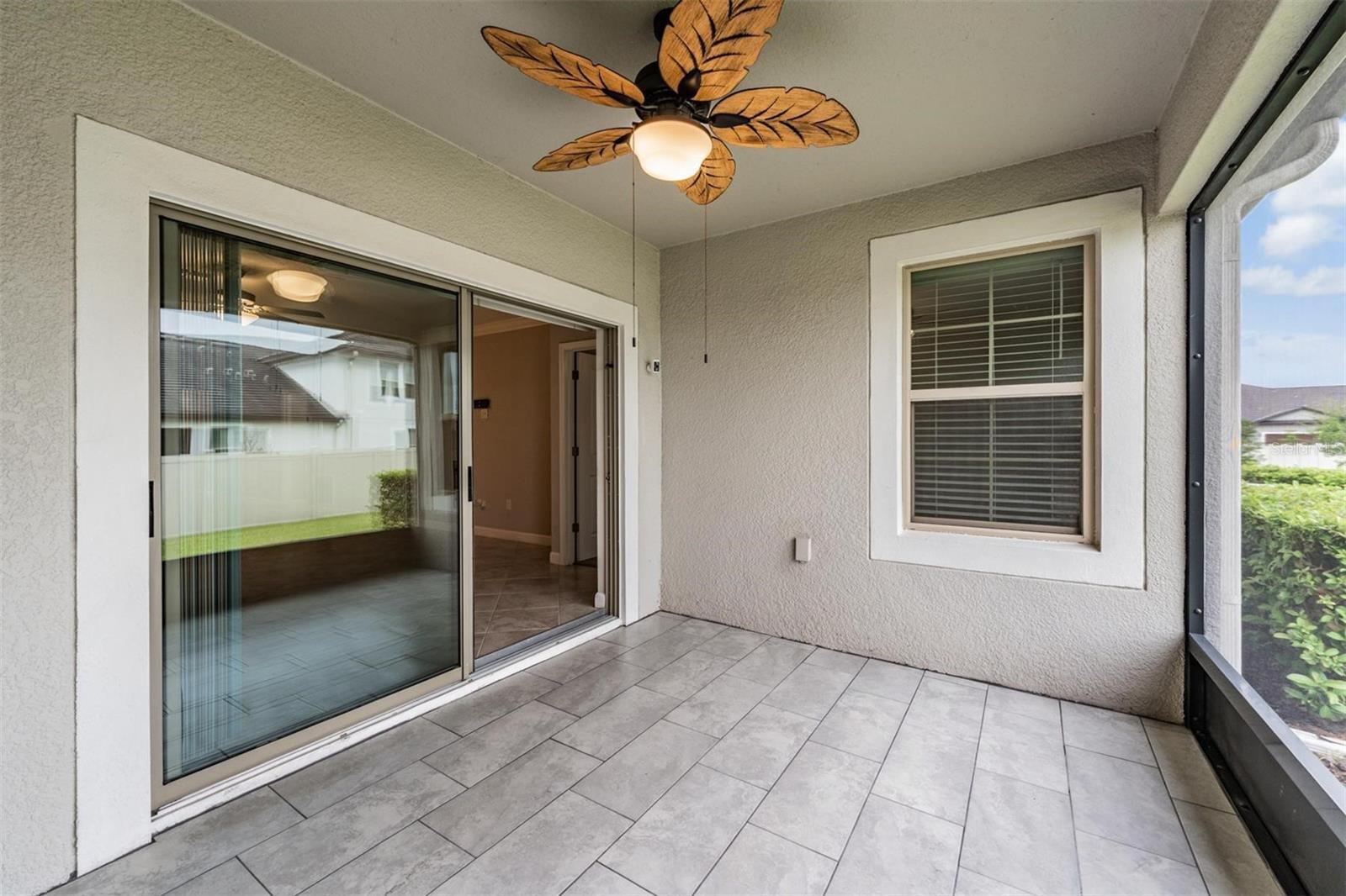 Lanai is tiled and screened