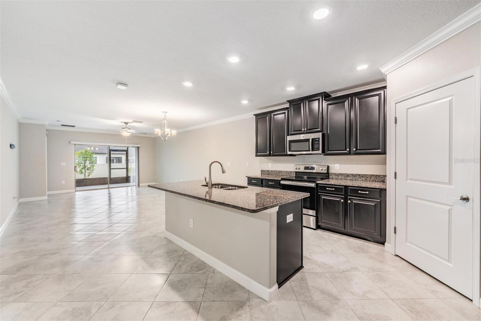 Kitchen is open to spacious family room