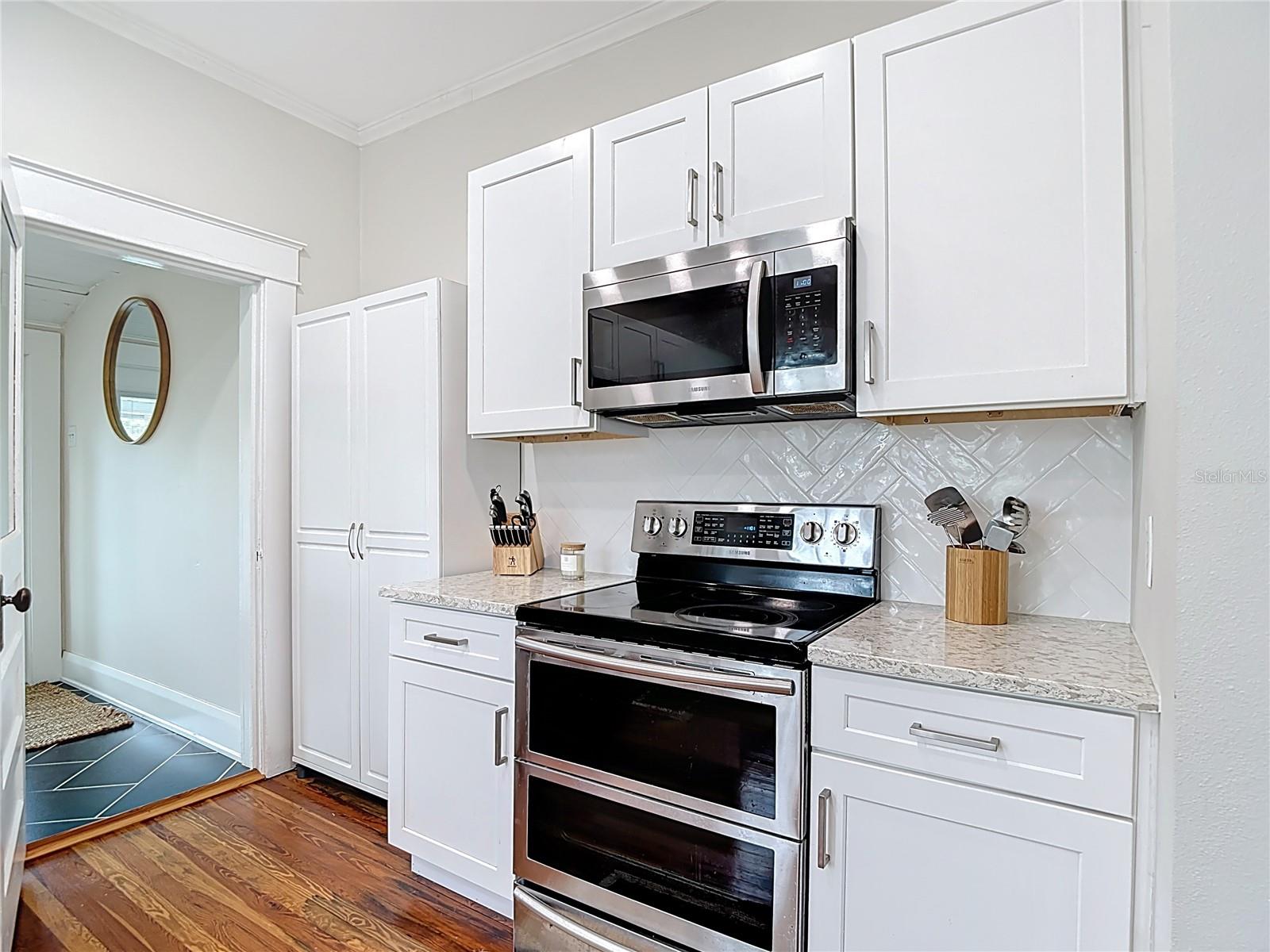 Oven, Microwave, Cabinets; Laundry Rm