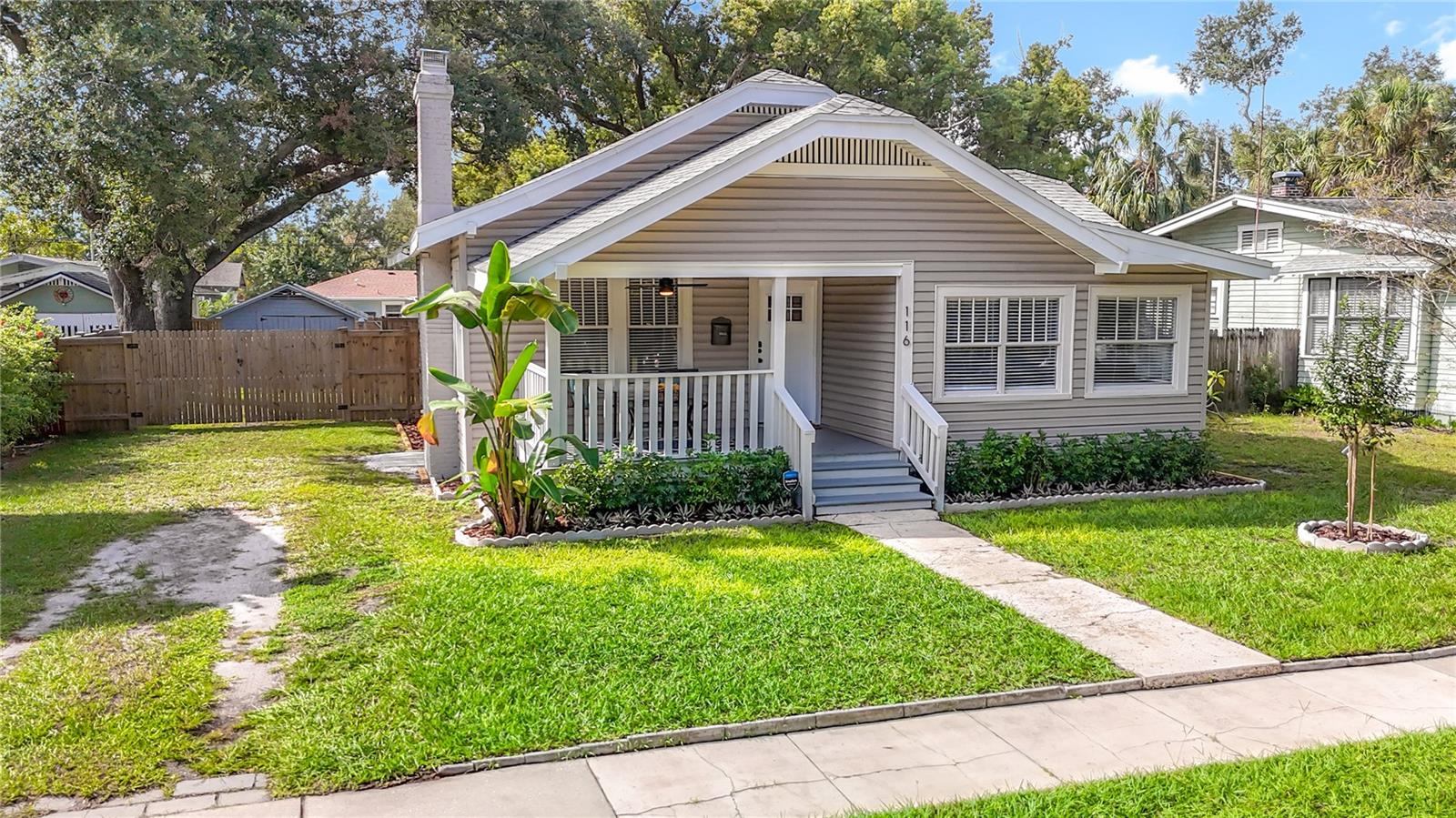 Front with Grass Driveway