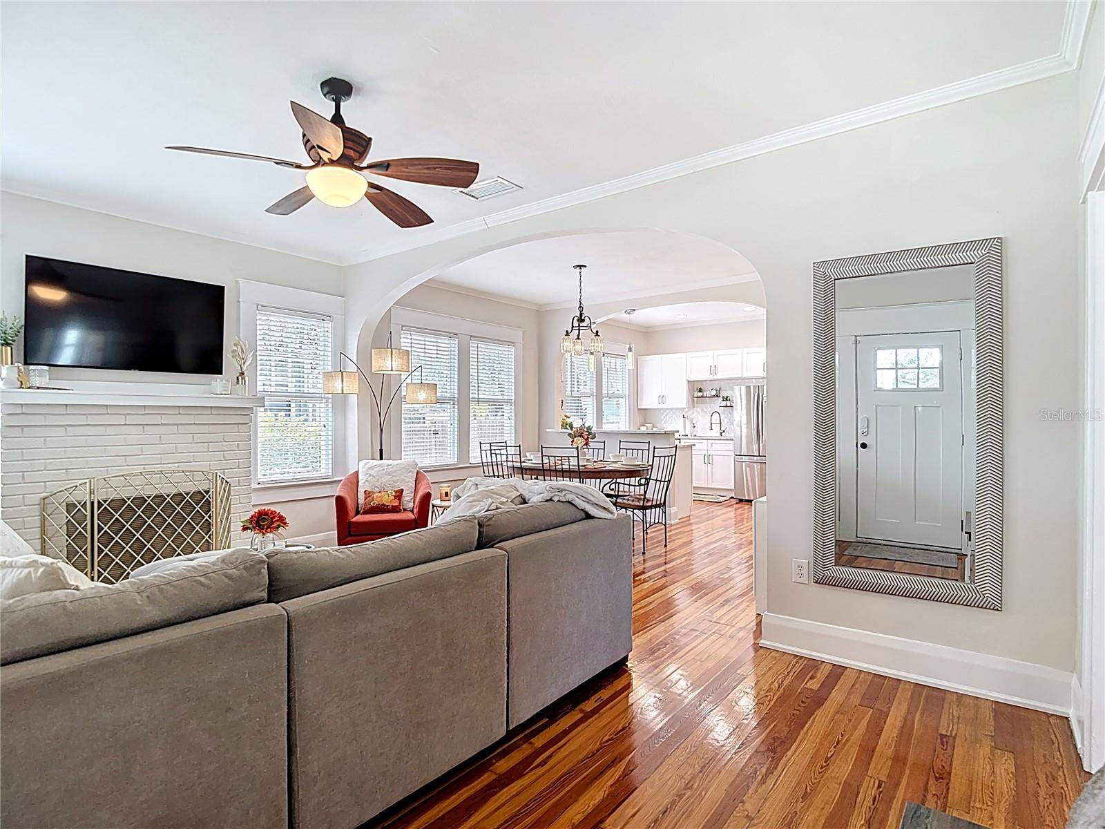 Front Entry, View of LR, Dining Rm Kitchen and Archways