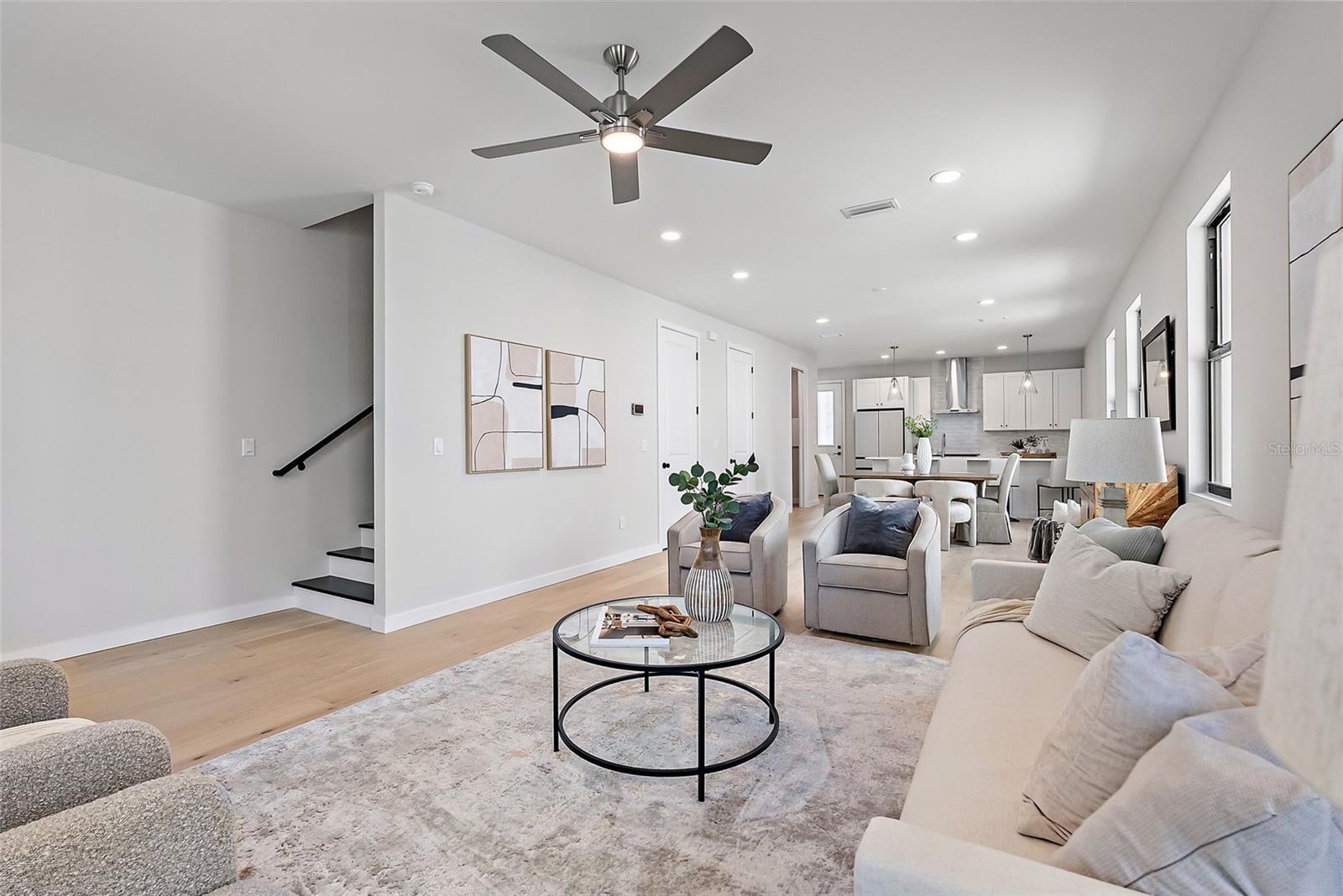 1st Floor features the Living room, Dining room, Kitchen, and a half bath.