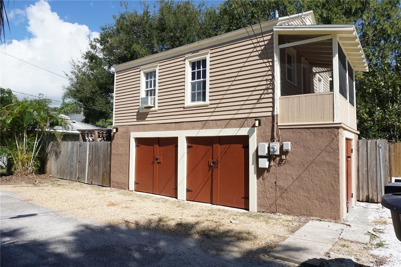 Alley view of garage/ apartment