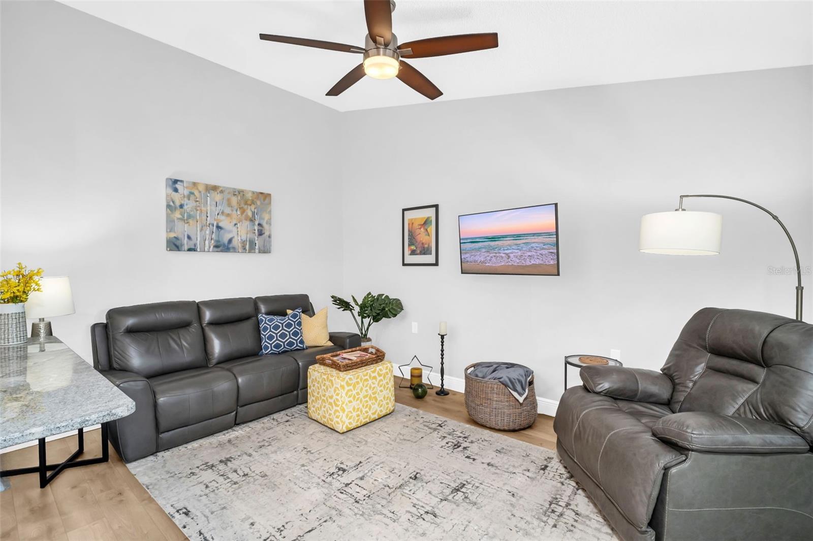 Spacious family room plus the extended granite counter offers bar stool seating space~