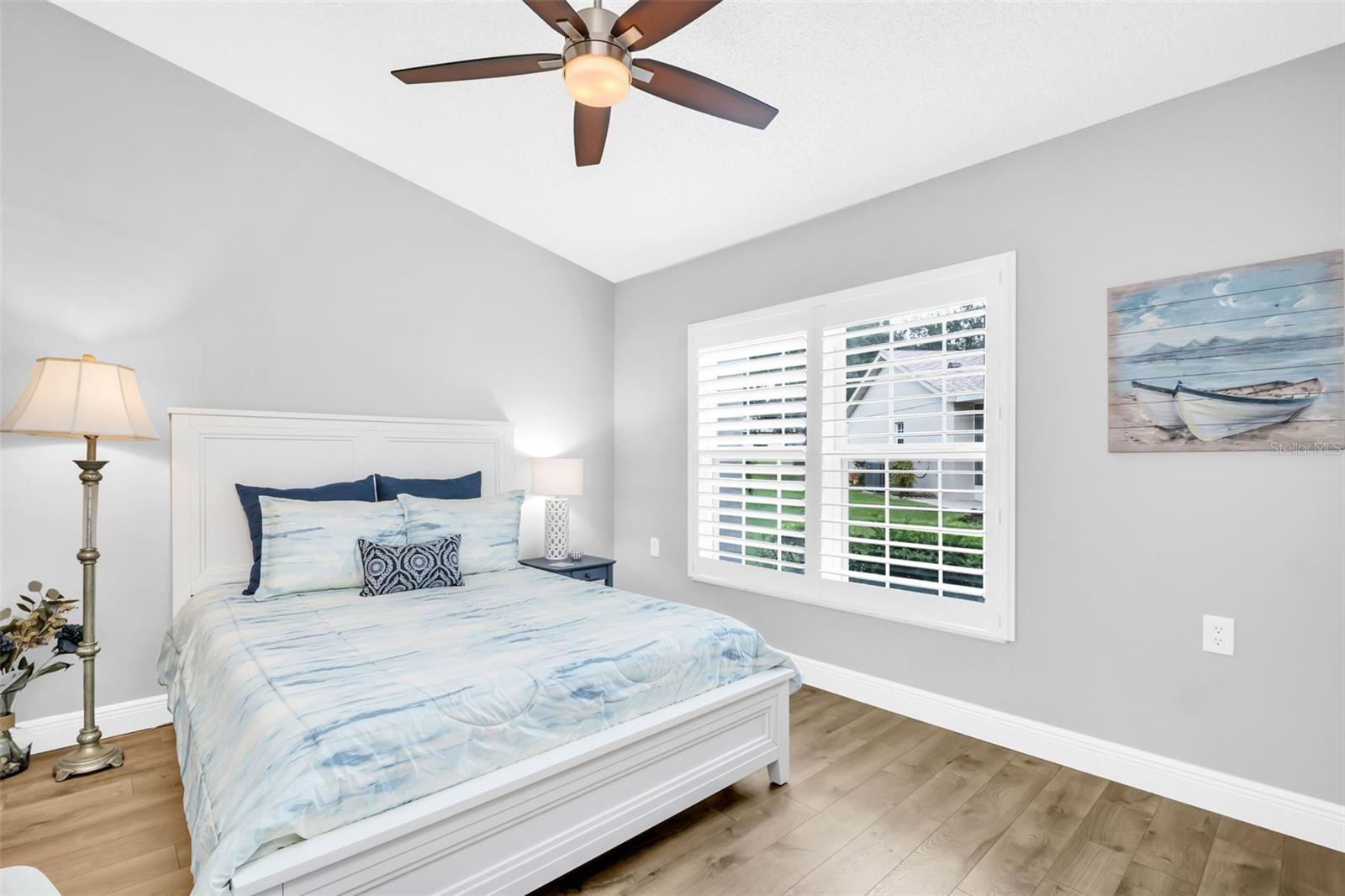 Guest suite privately located at the front of the home also featuring vaulted ceilings~