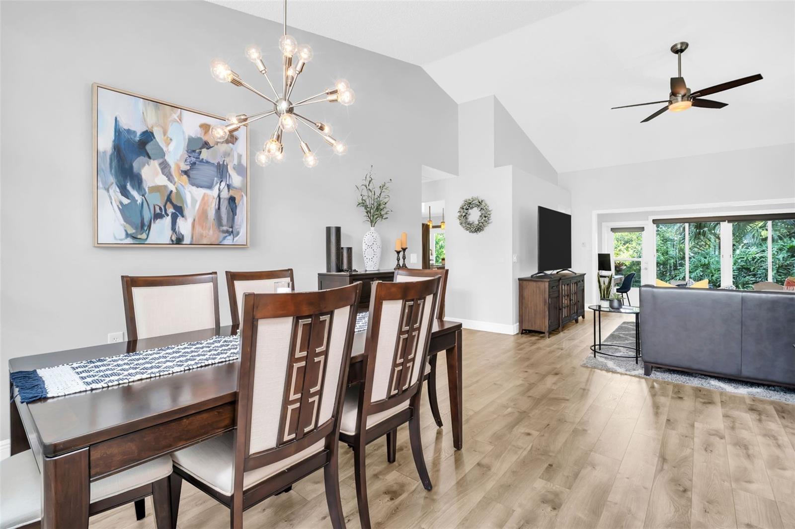 Soaring vaulted ceilings in every room and peaceful green views immediately upon entry~