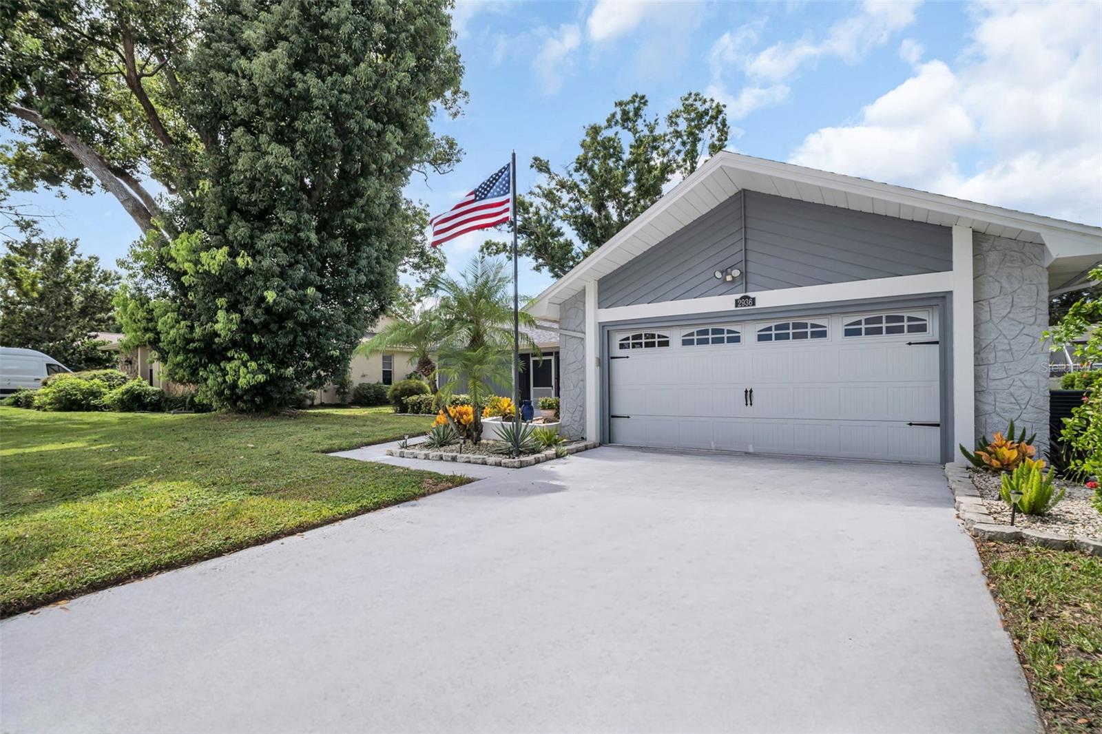 New garage door, freshly painted exterior, and roof in 2021~