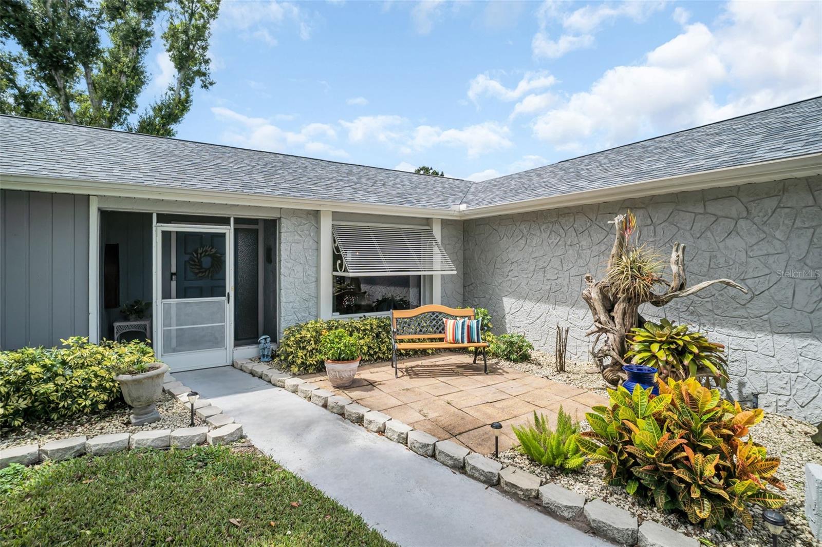 Screened front entry & front patio~