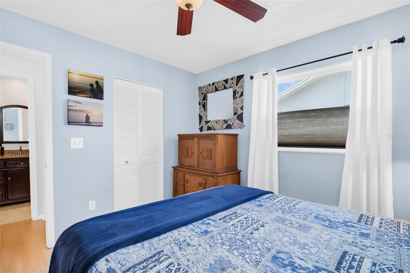 Features a walk-in closet and adjacent to the hall bath for guest privacy~