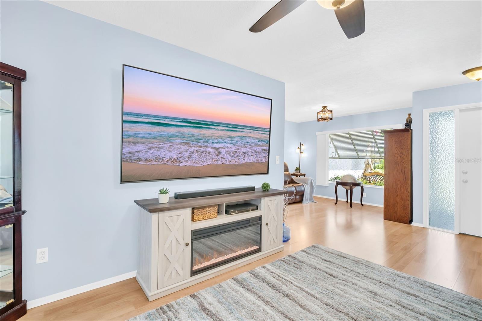 Neutral colors and abundant natural light flows throughout~