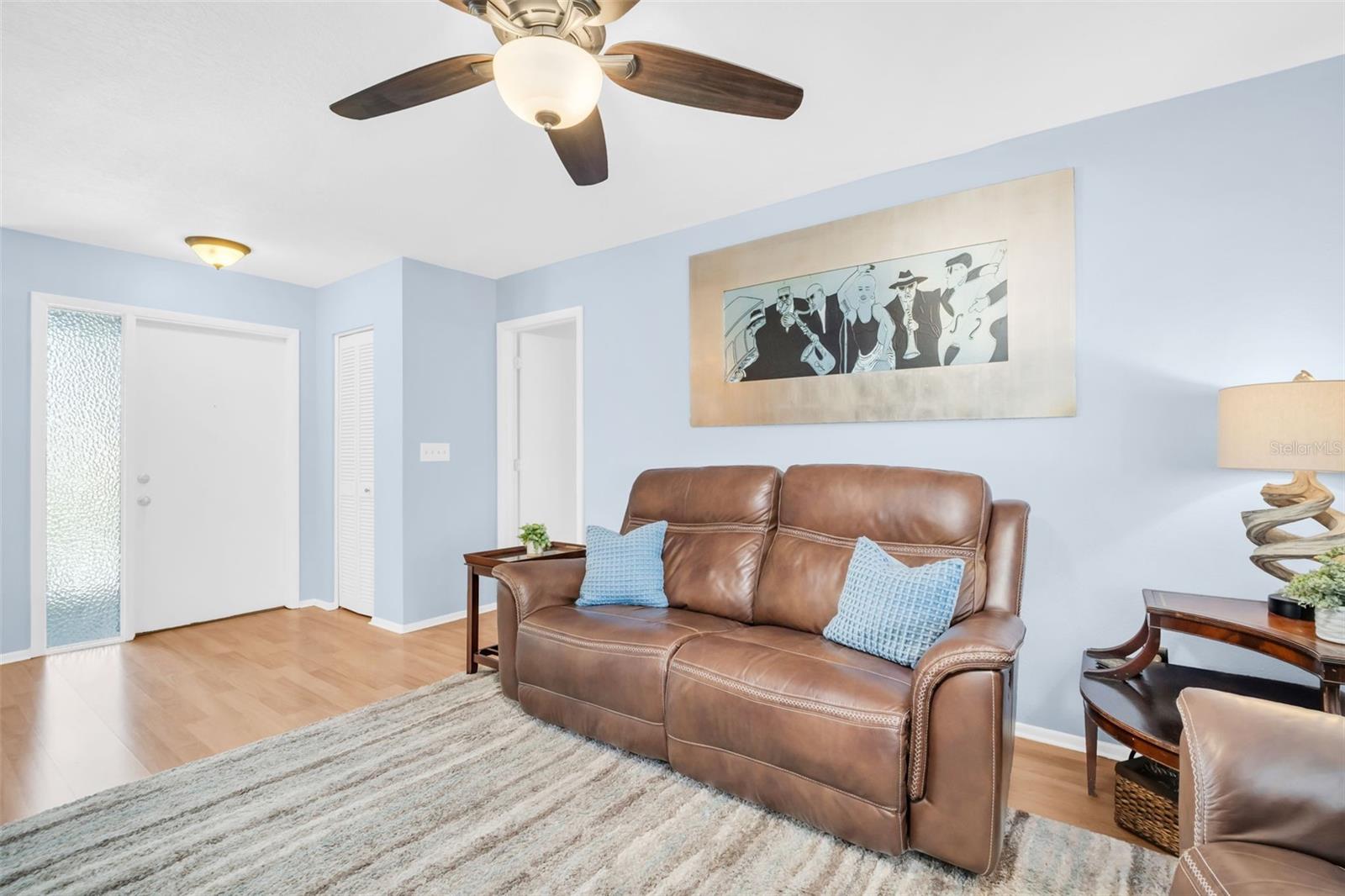 Convenient front entry closet and welcoming glass front door window~