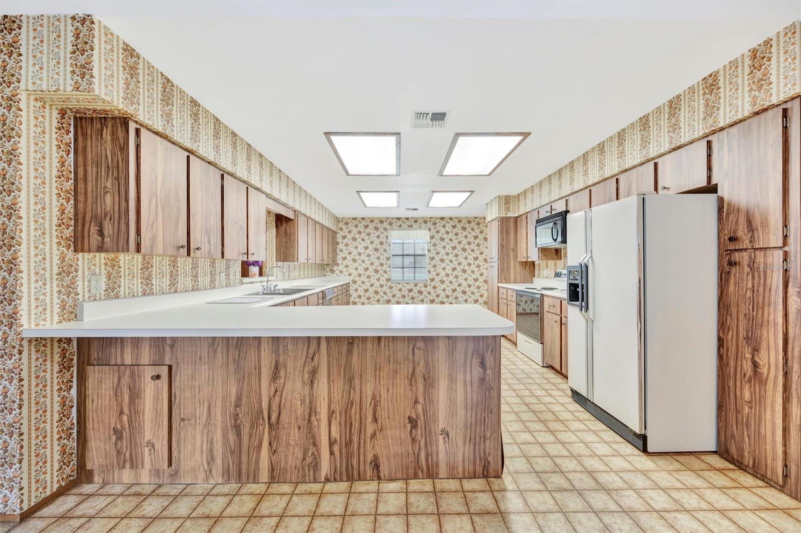 Breakfast bar area perfect for casual dining or morning coffee.