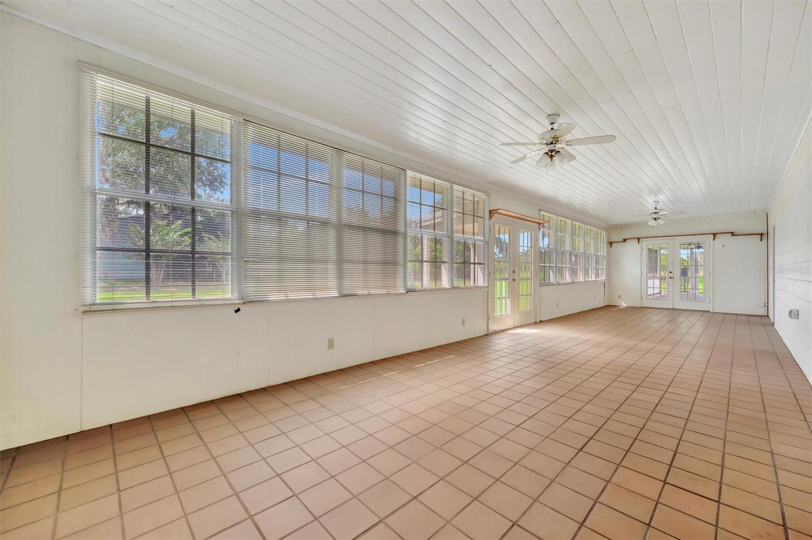 Sun Room-Enjoy peaceful country views in this bright and airy sunroom.