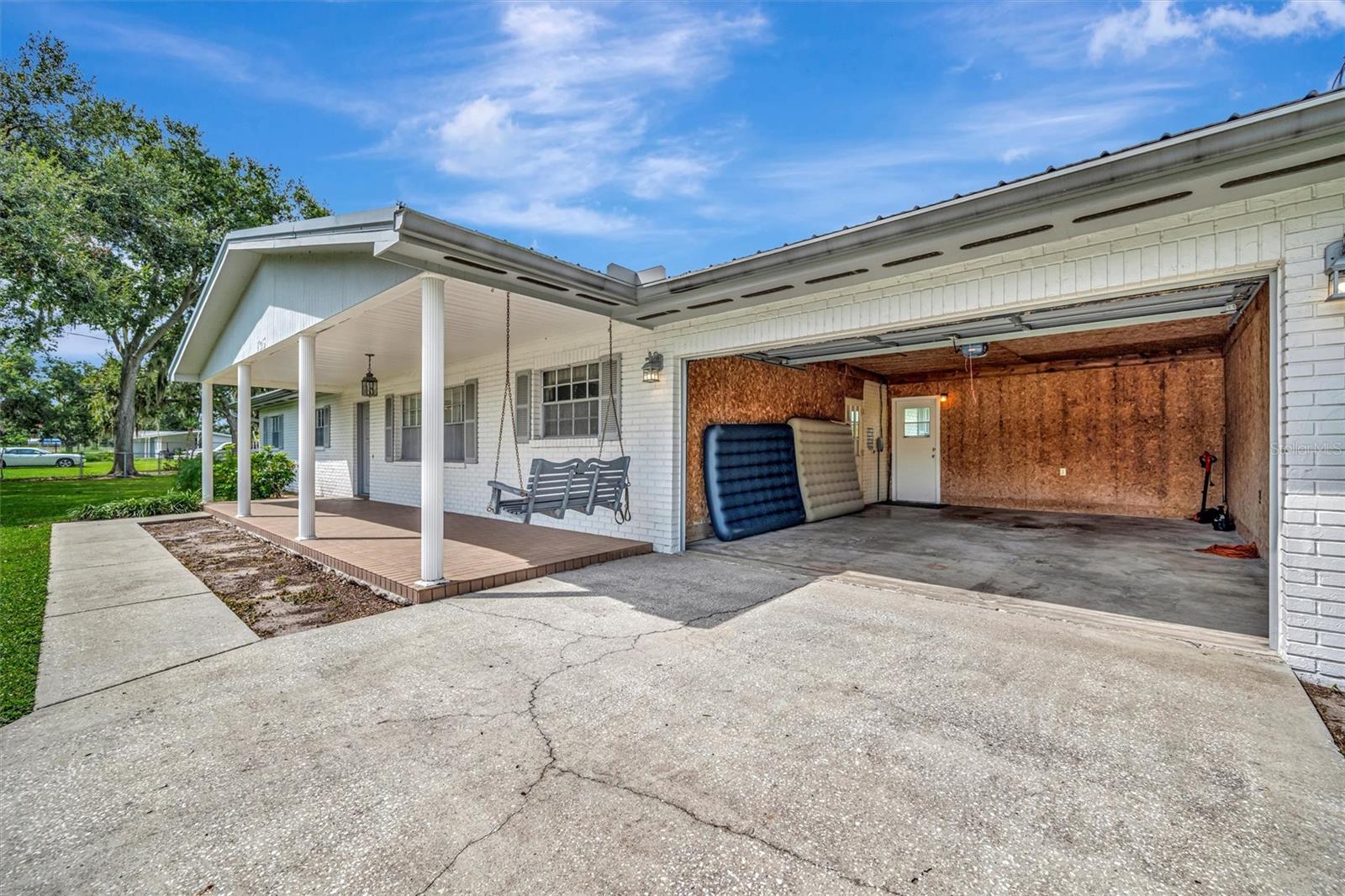 Attached main garage offers easy access and everyday convenience.
