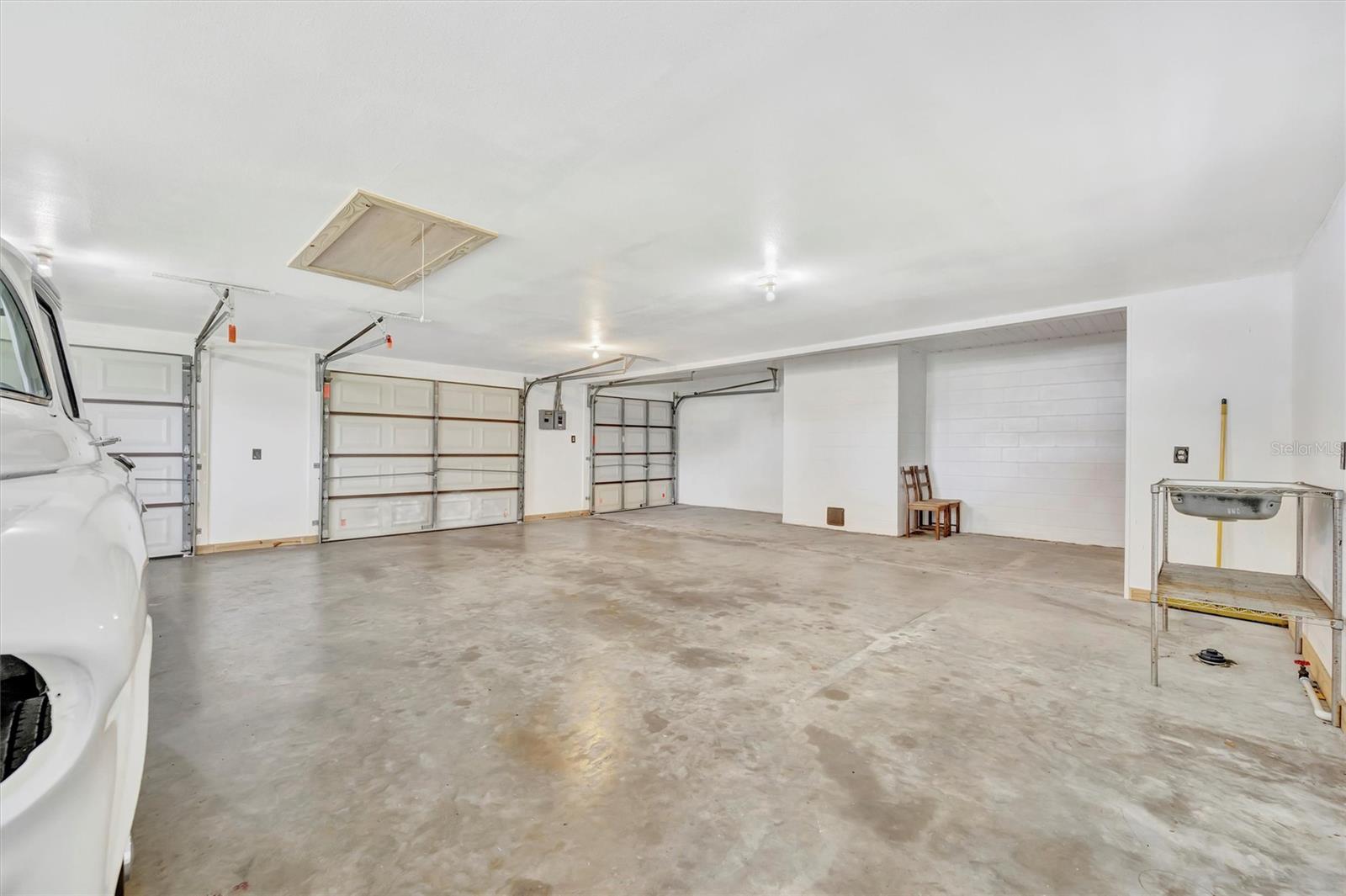 Expansive side garage perfect for car collectors,