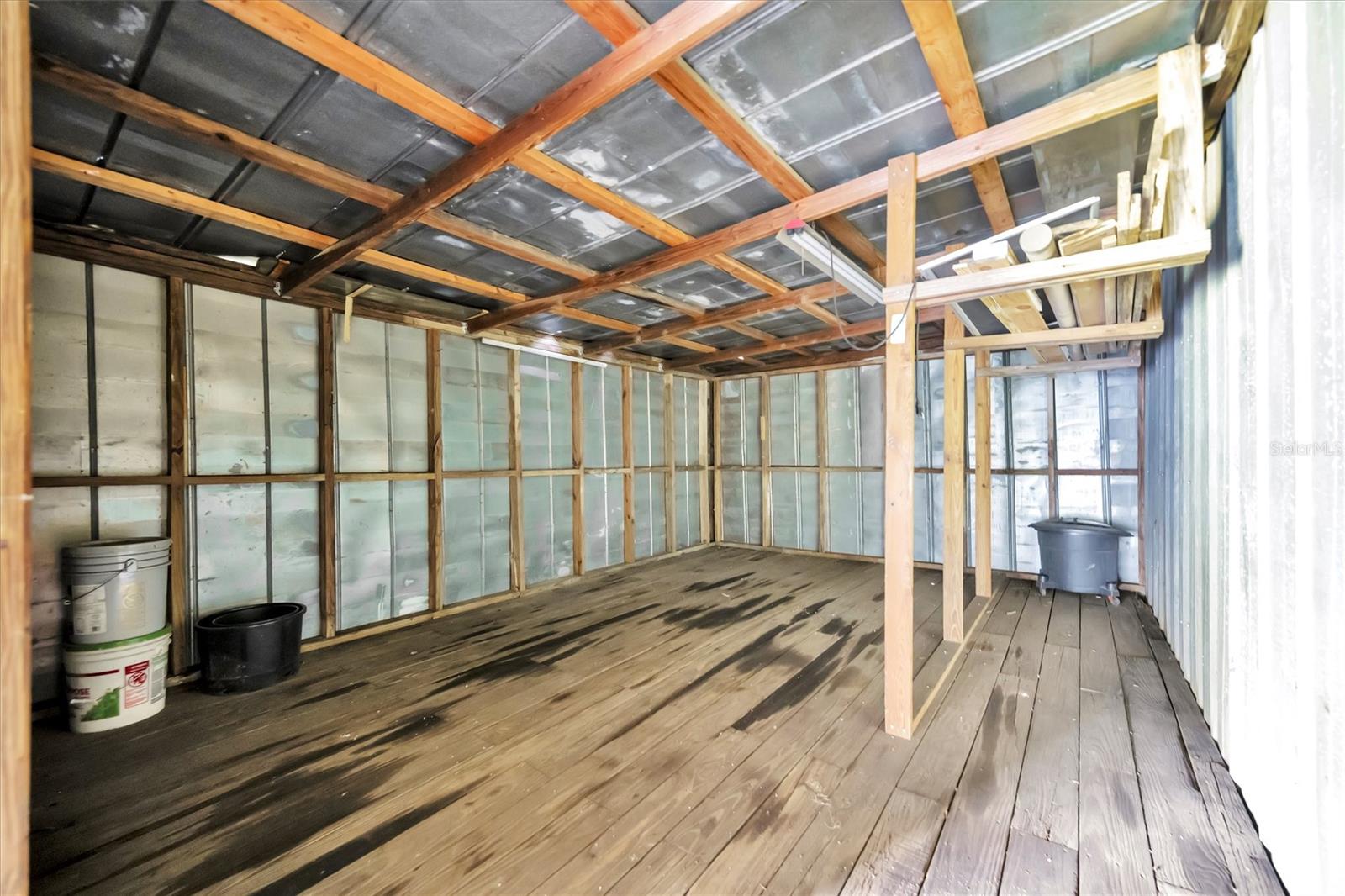 Dedicated workshop and storage area connected
