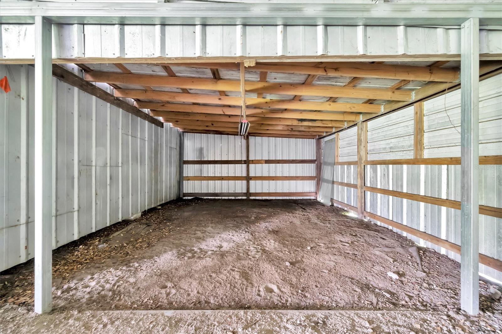 Multiple garages located at the back of the property