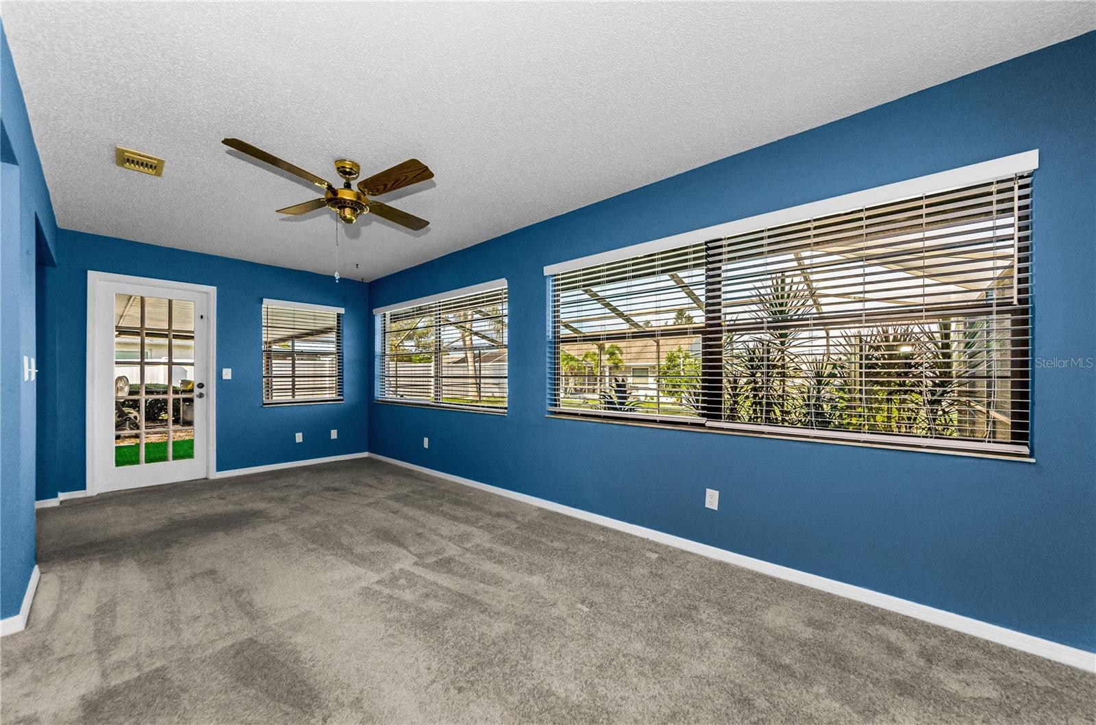 Family room leading to the lanai and pool