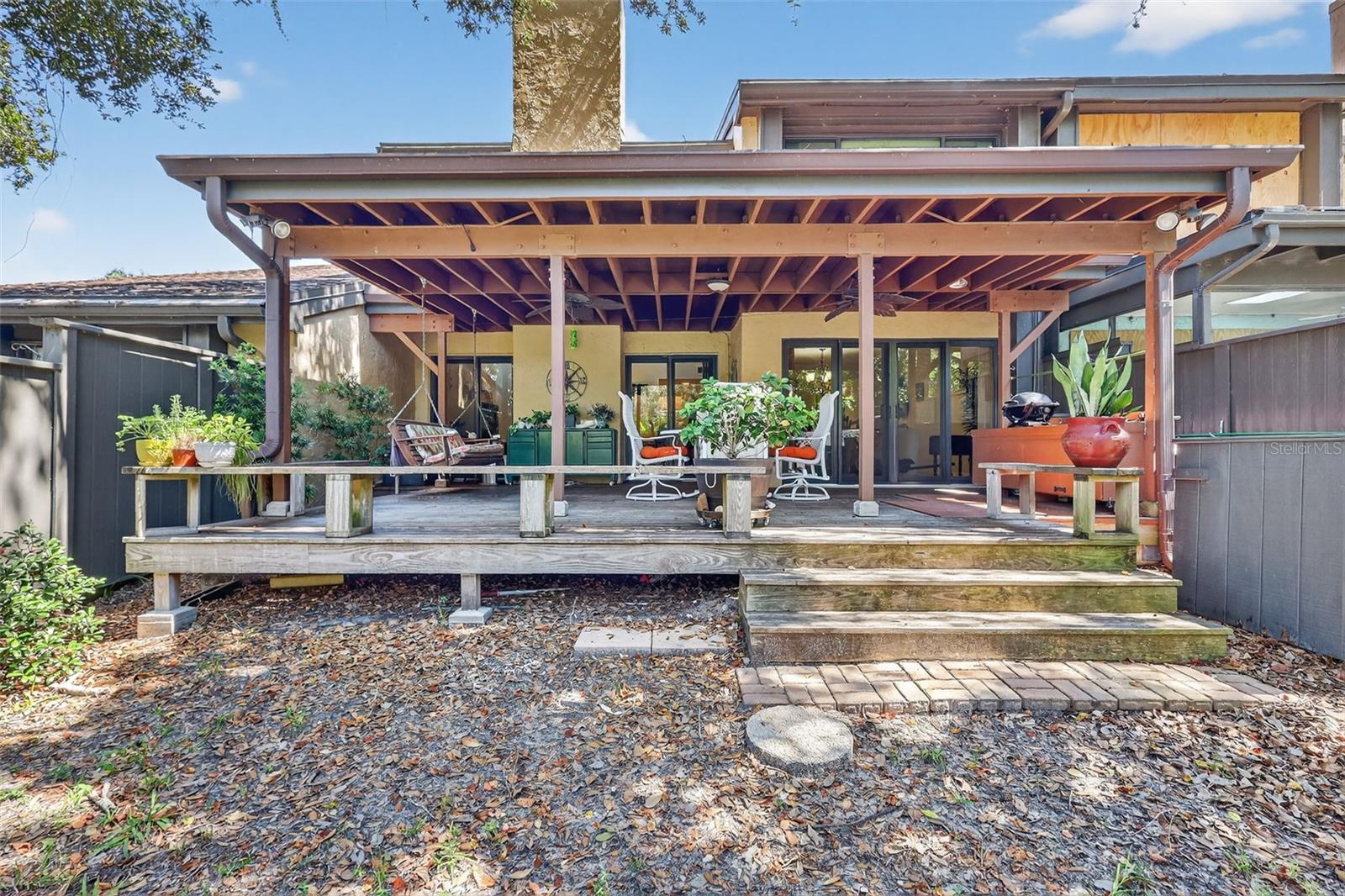 If the front courtyard is not enough space for you to entertain you have an elevated covered deck on the back of the home to enjoy with family and friends.