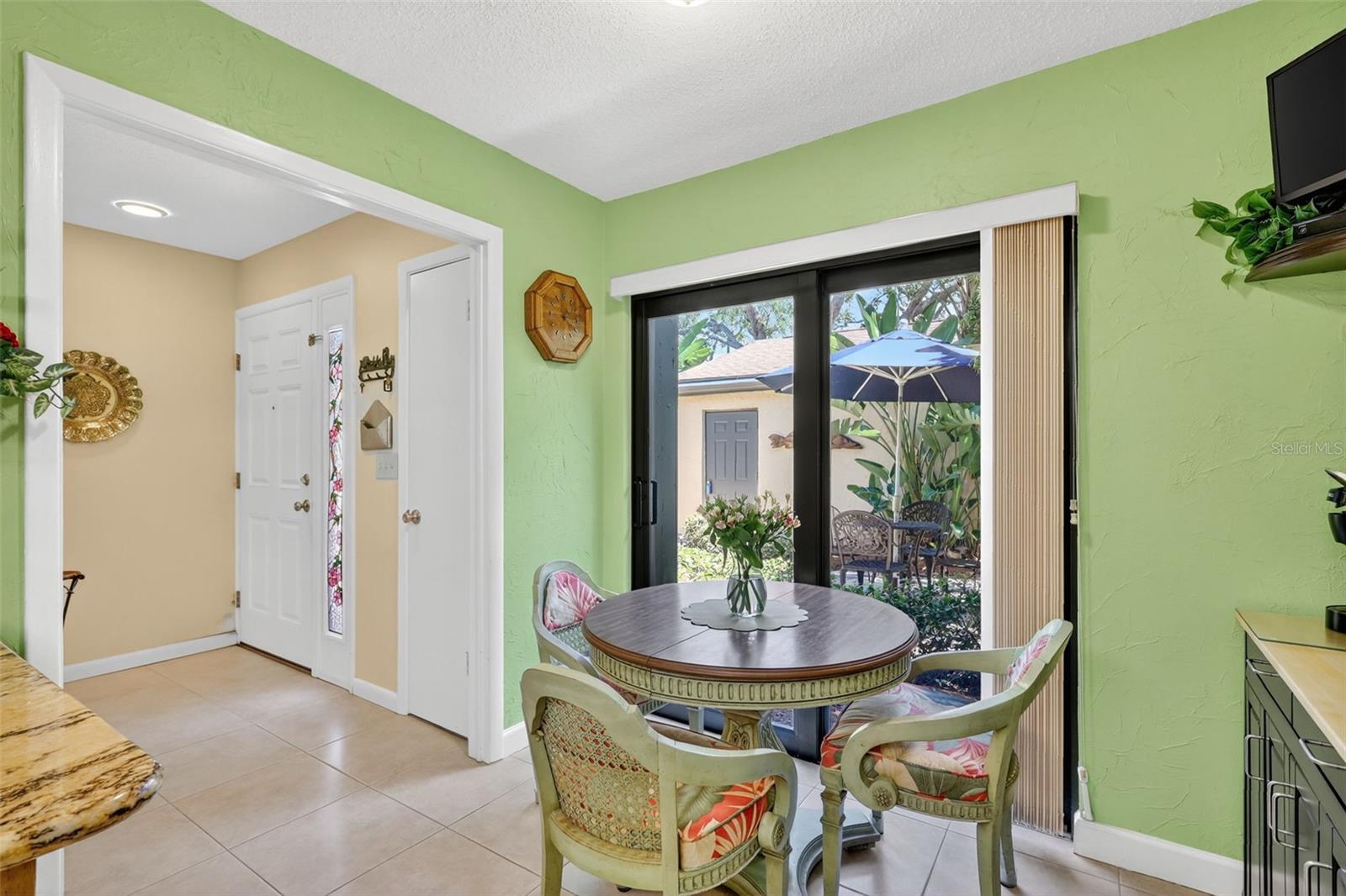 Off your entrance is a small closet and access to the kitchen and dinette area with a slider leading out to your front courtyard.