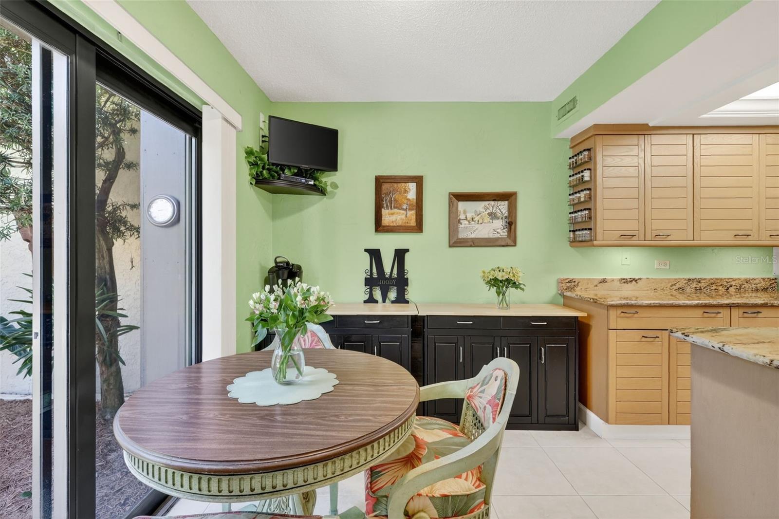 Your kitchen has room for a dinette and also has doors leading out to your front patio area.