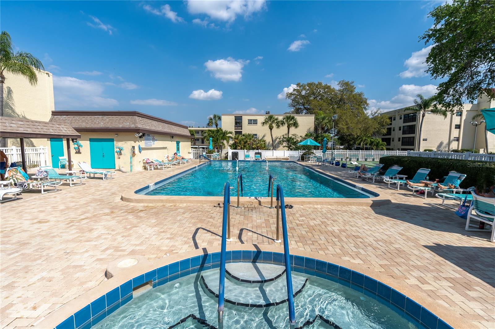 Relaxing spa area and a refreshing pool, perfect for enjoying the outdoors.