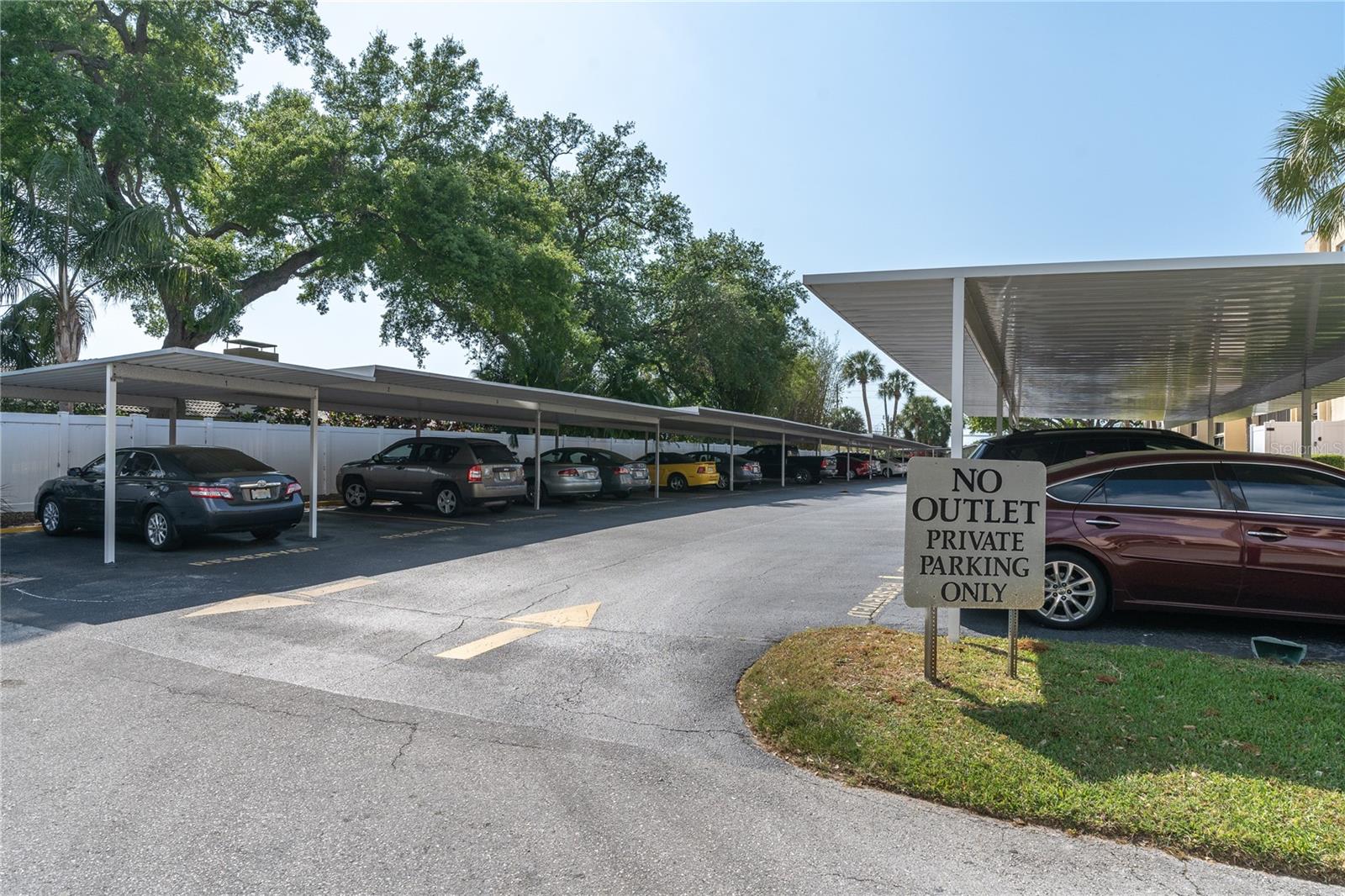 Covered Parking, Unit 207 has carport space #12