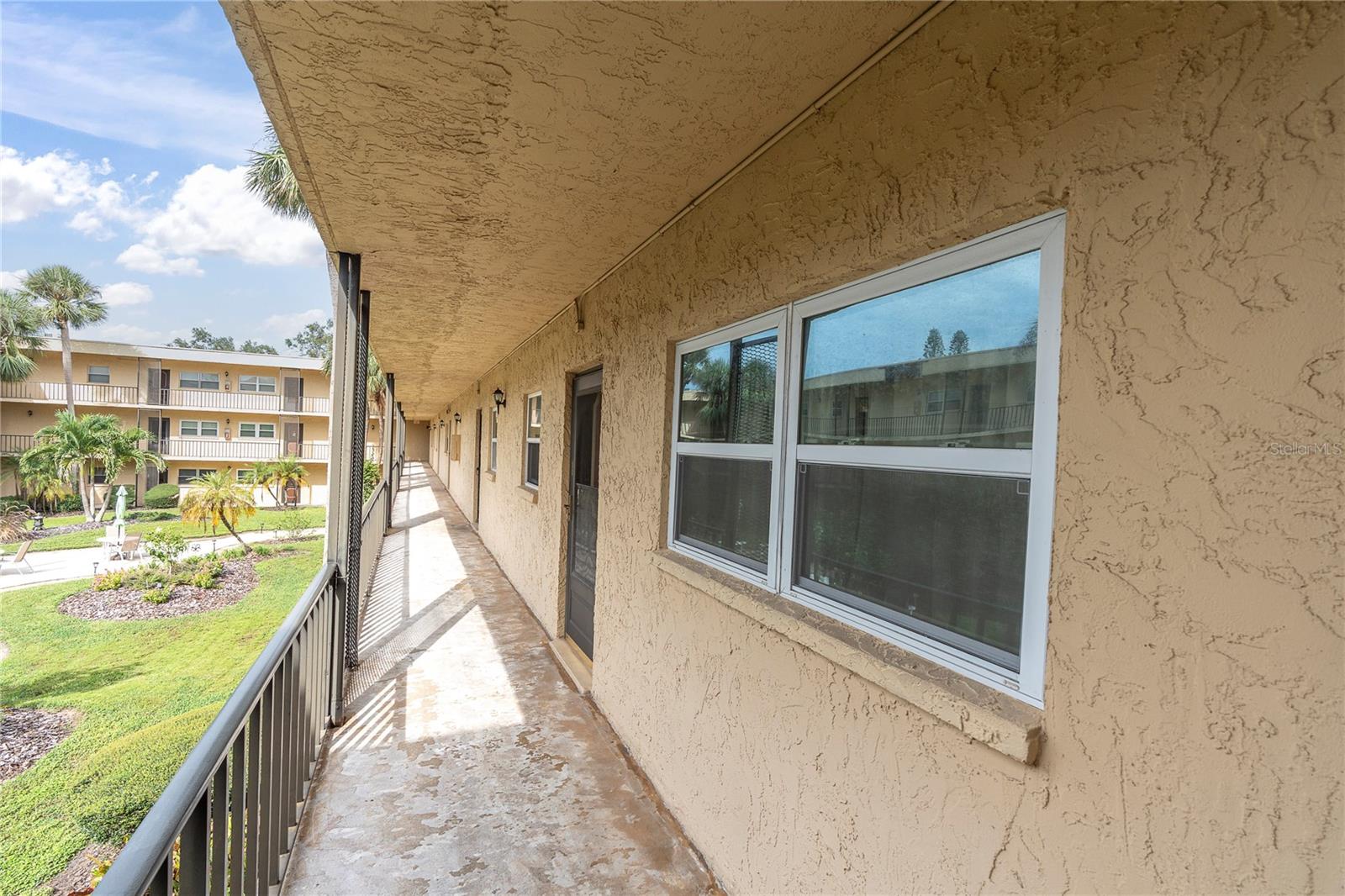Entrance to unit 207 and Outside corridor to unit 207