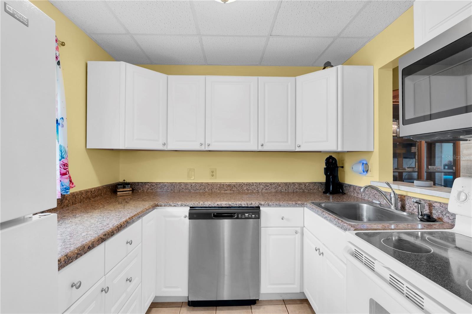 Kitchen with stainless steel dishwasher and lots of cabinet space