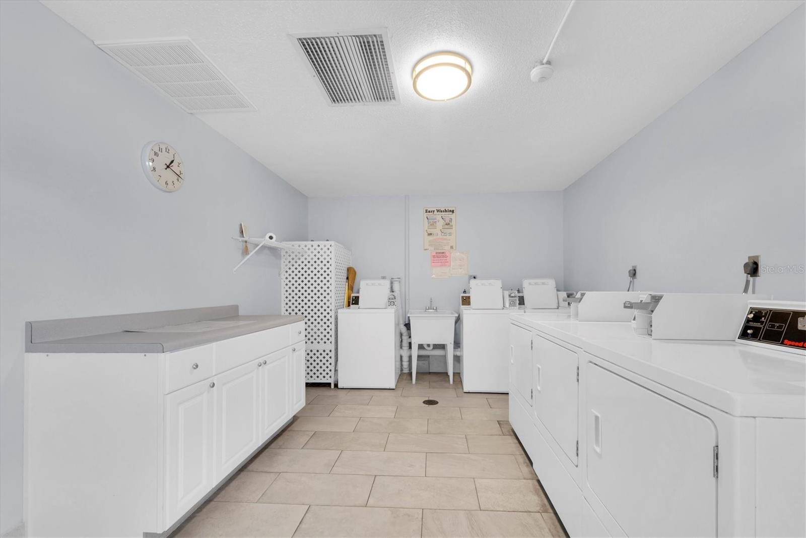 Laundry located on same level, across corridor