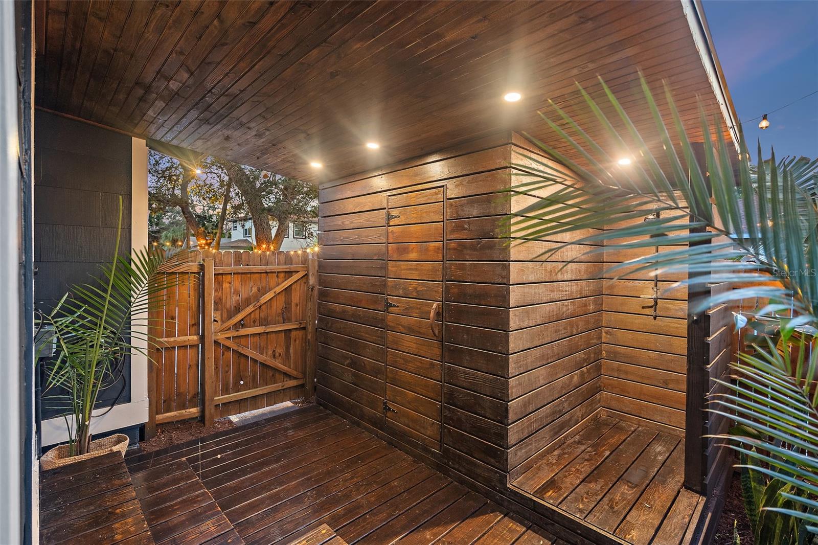 Covered Patio in front of Sauna with Outdoor Shower