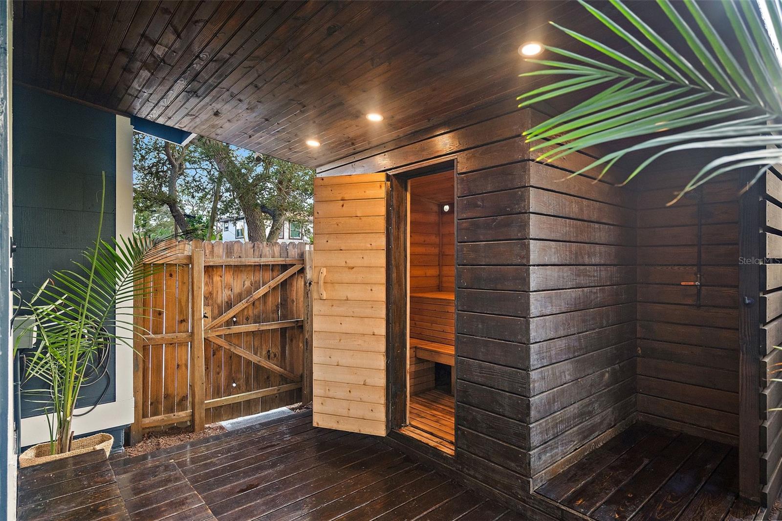 Covered Patio in front of Sauna with Outdoor Shower