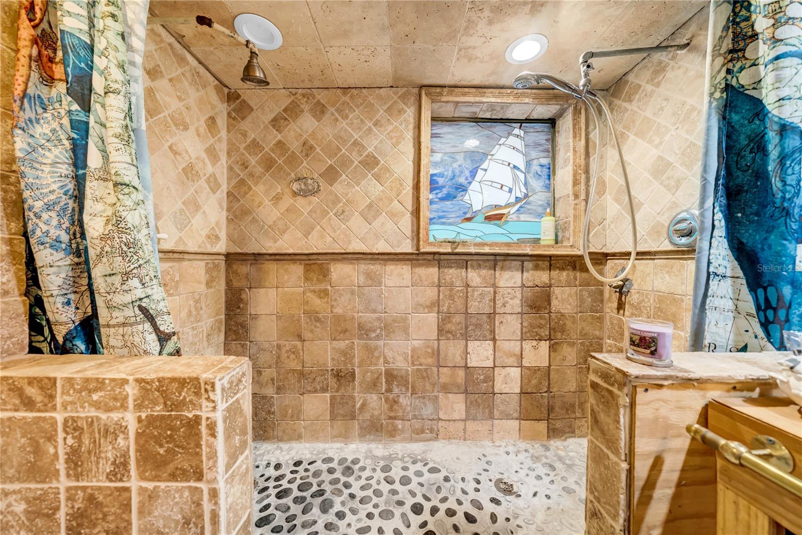 Bathroom inside hidden bookshelf wall