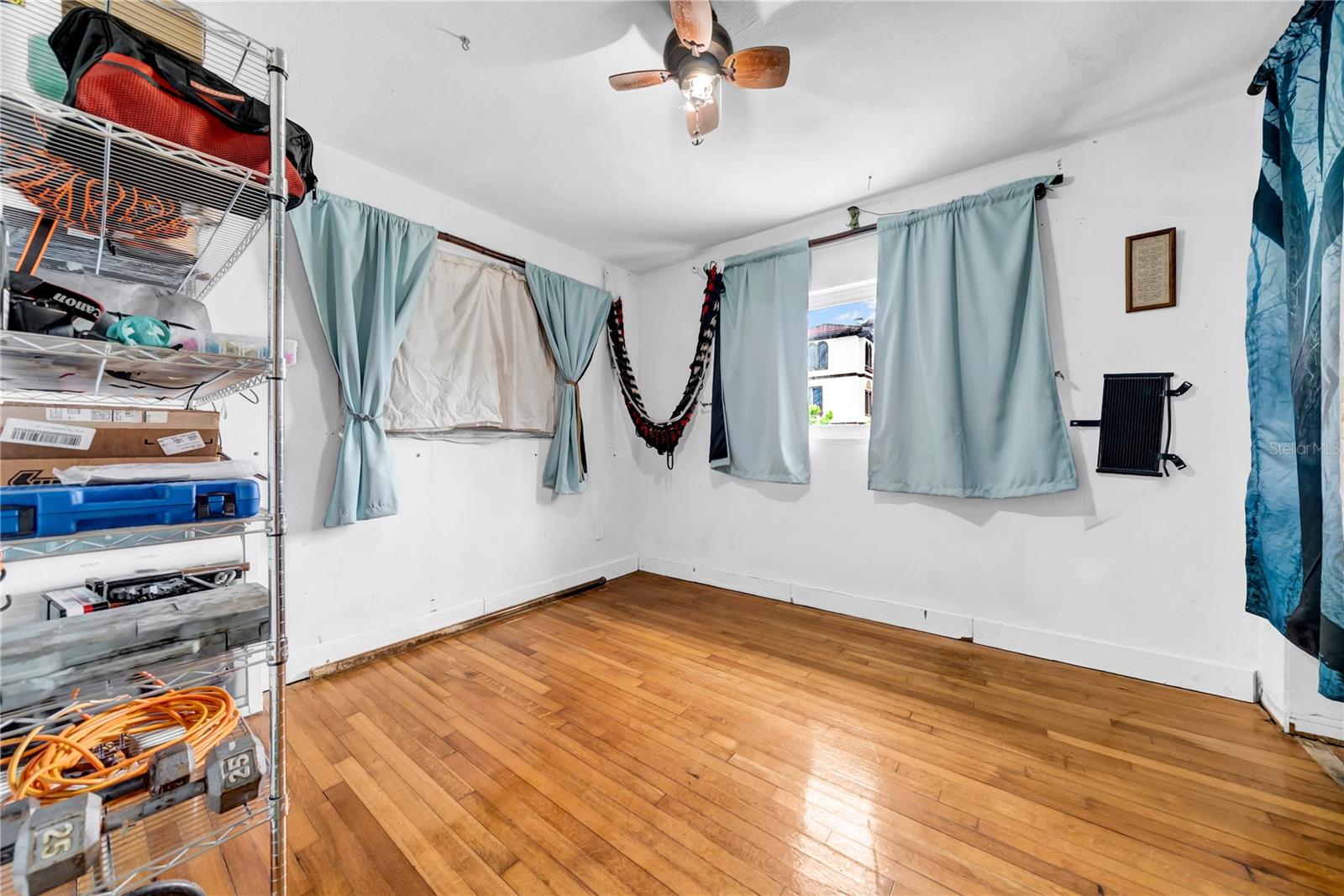 Bedroom inside hidden bookshelf wall