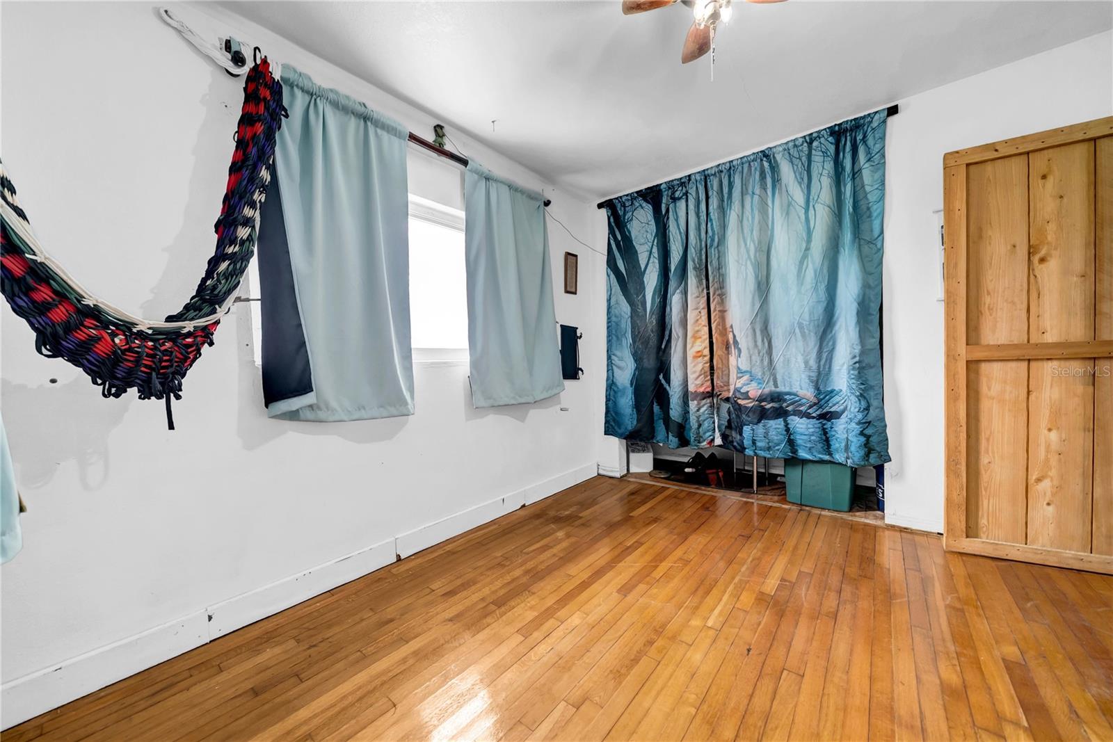 Bedroom inside hidden bookshelf wall