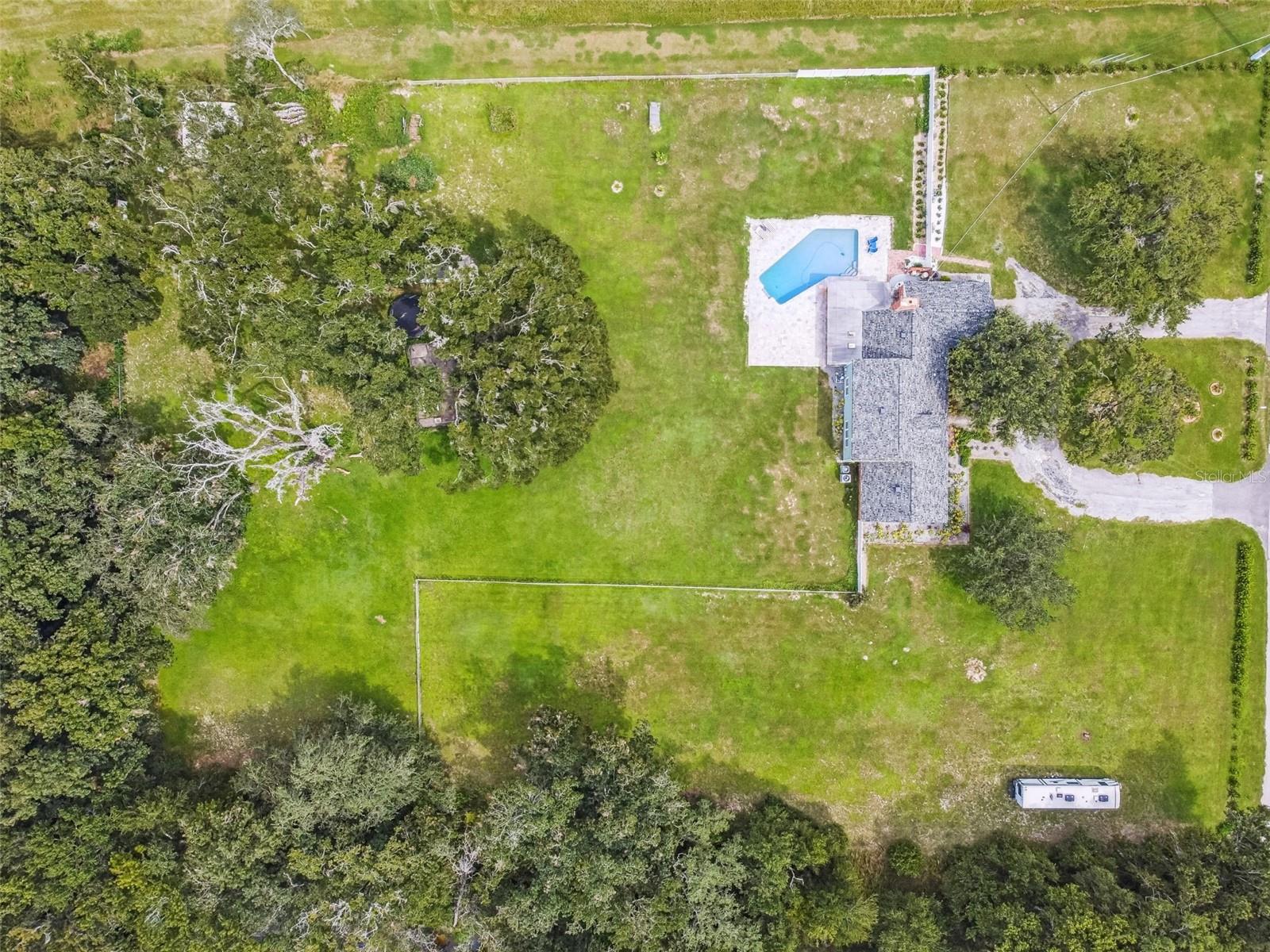 2.5 acres of privacy being the ONLY home on street!