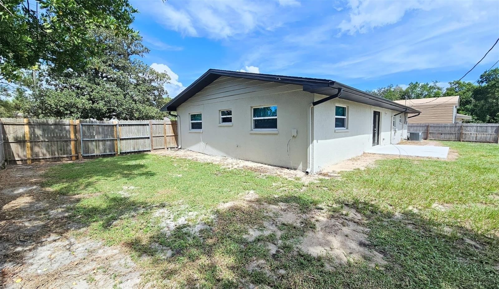 LARGE FENCED IN BACKYARD WITH DOUBLE GATES