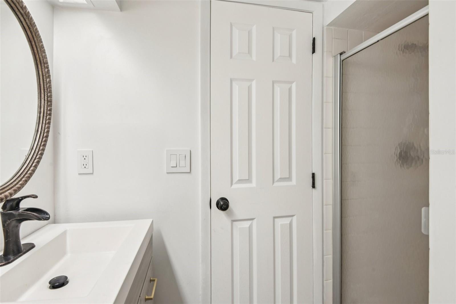 Make sure to look behind the door if you walk into the bathroom and leave the door open. The large shower is behind it.  This is the 2nd floor bathroom by the kitchen.