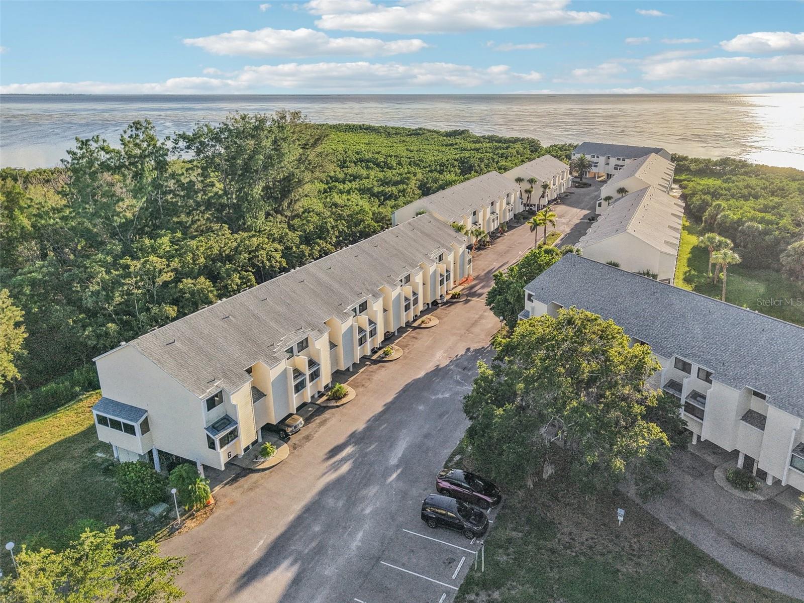 Aerials of the entire community and views of the water.