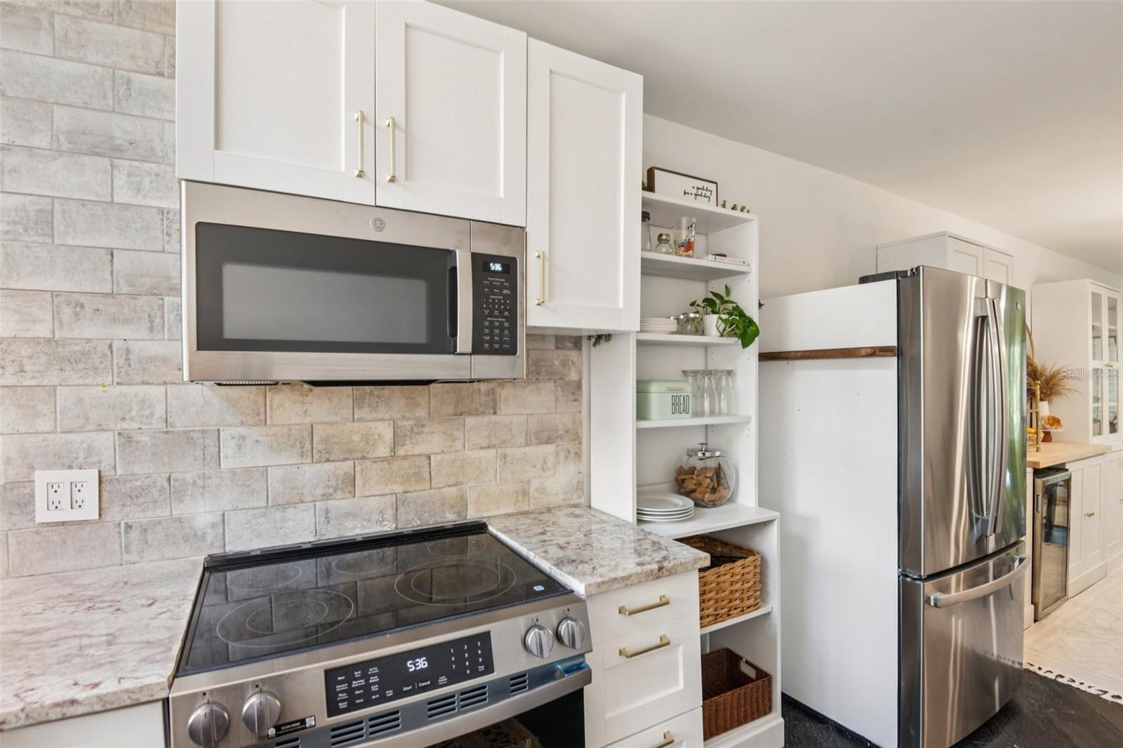 Brand new stainless appliances in remodeled kitchen.