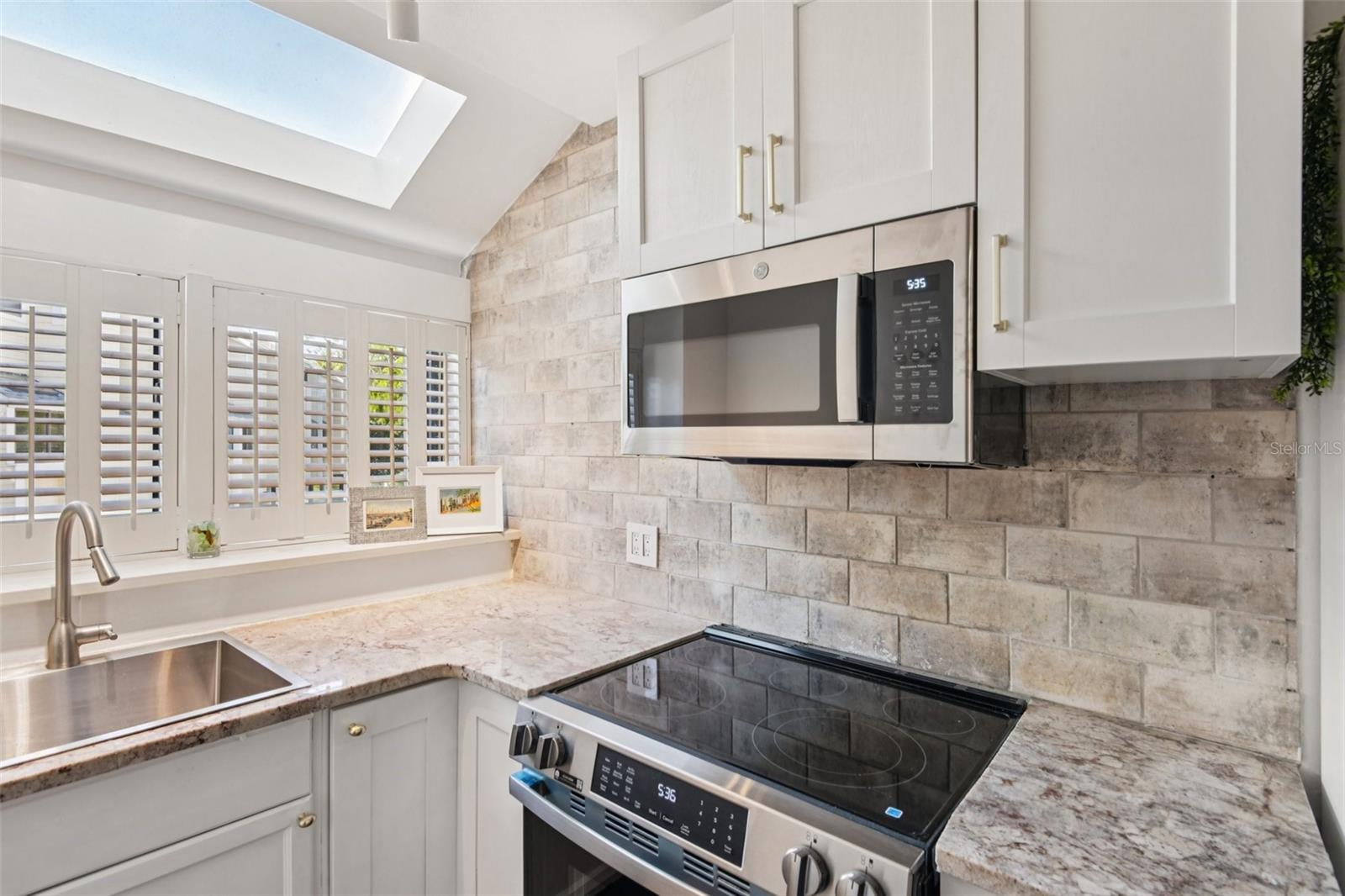 Kitchen with view of skylight,