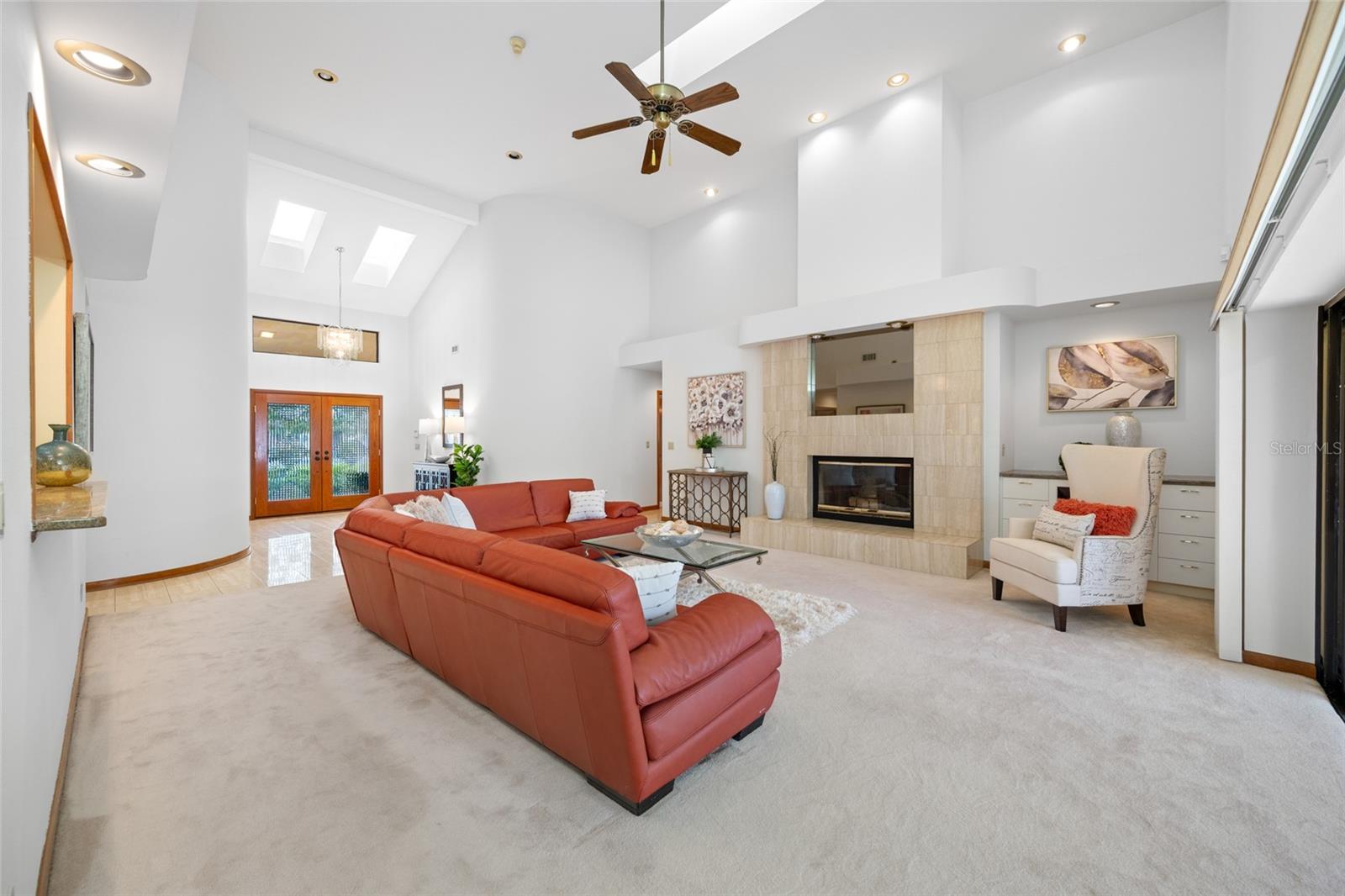 Living room facing fireplace