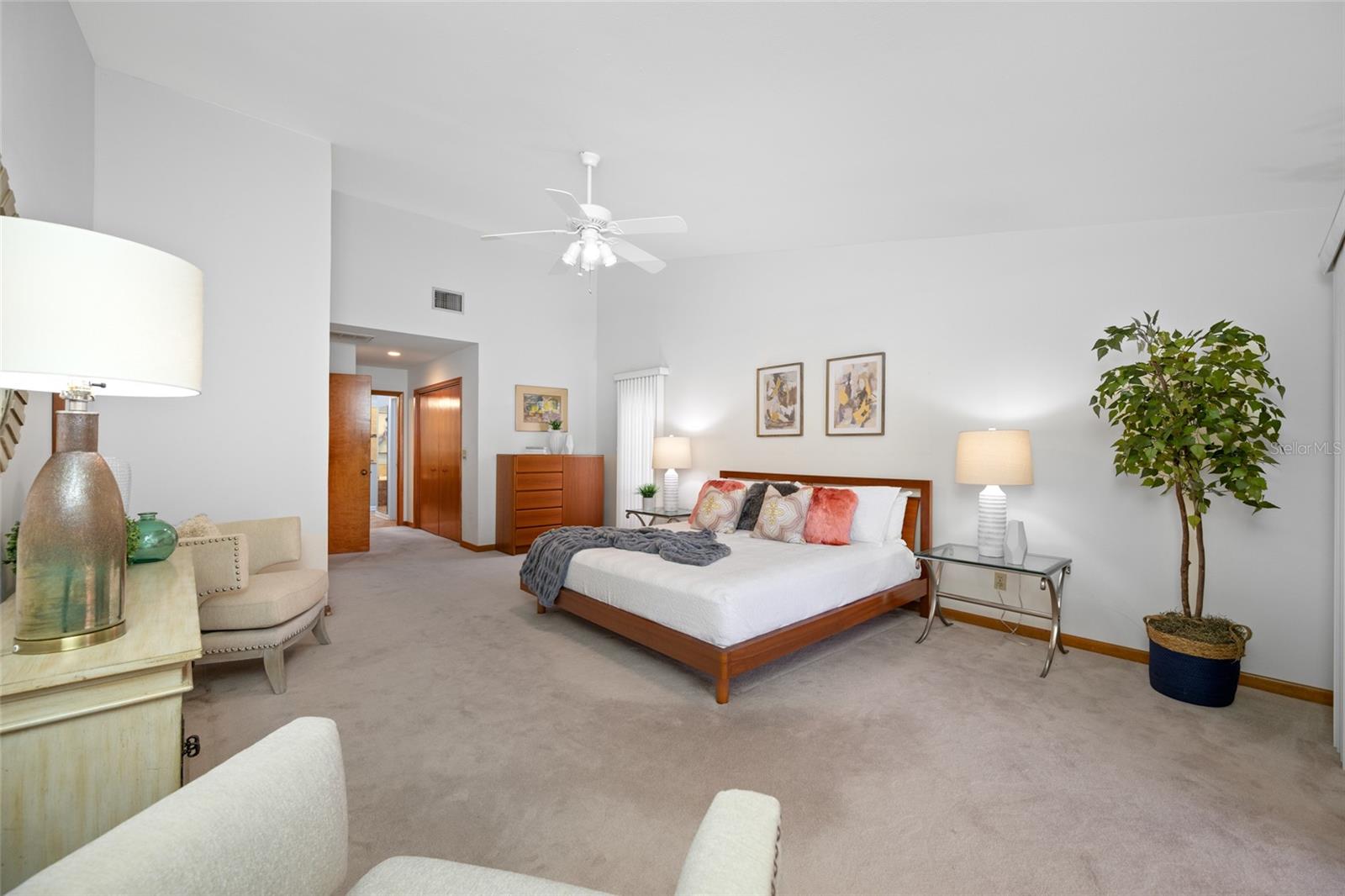 Primary bedroom suite with sitting area